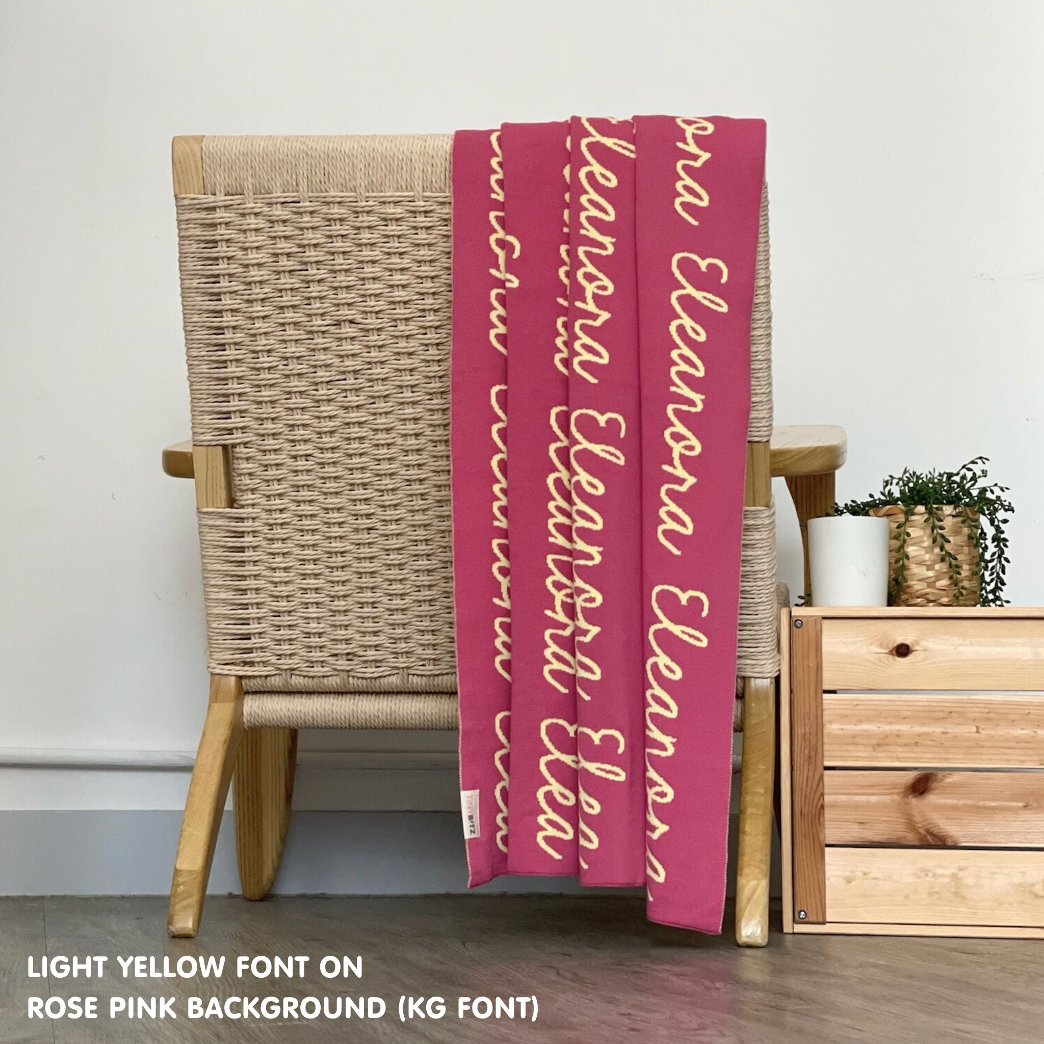 Personalised pet blanket for dogs in rose pink and light yellow, custom knitted dog blanket by TinyBitz, cozy gift for small dogs.