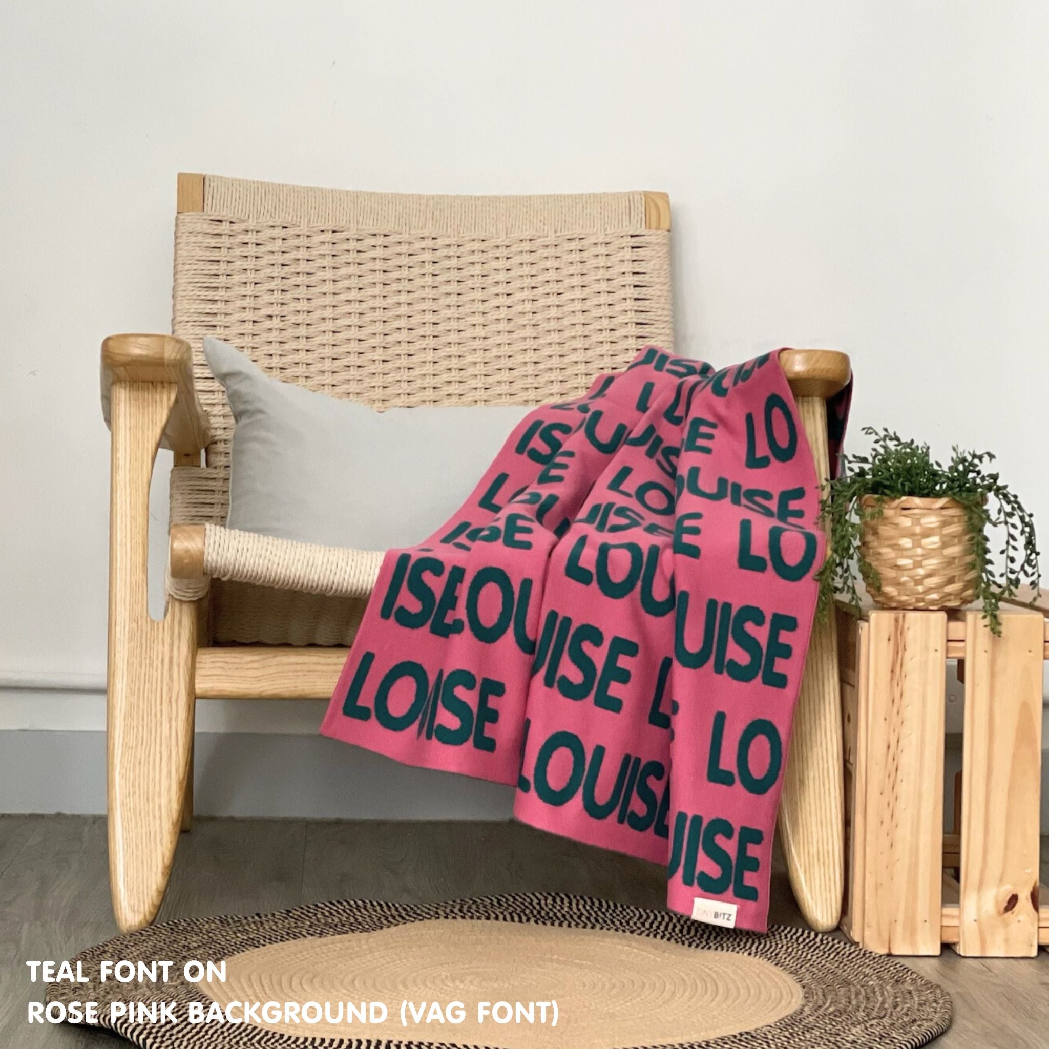 Personalised pet blanket in rose pink and teal knitted cotton, custom knitted dog blanket by TinyBitz, perfect gift for dog lovers.