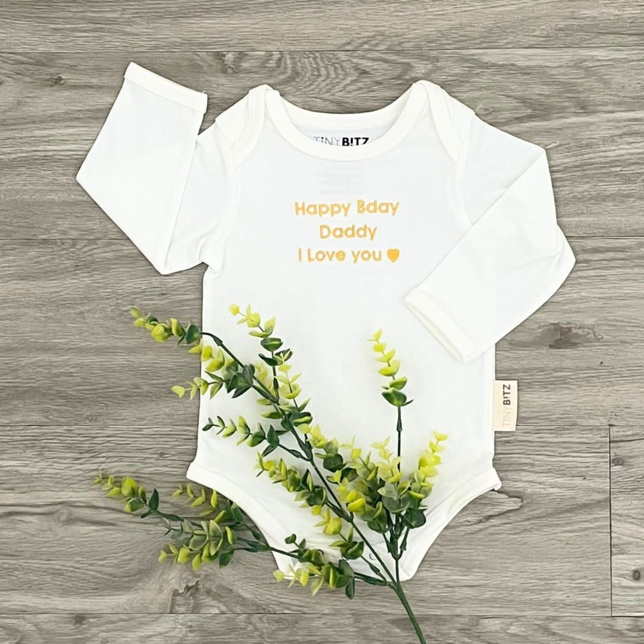 Organic cotton onesie for babies with quote “Happy Bday Daddy I Love you” in white, personalized baby shower gift keepsake from TinyBitz.