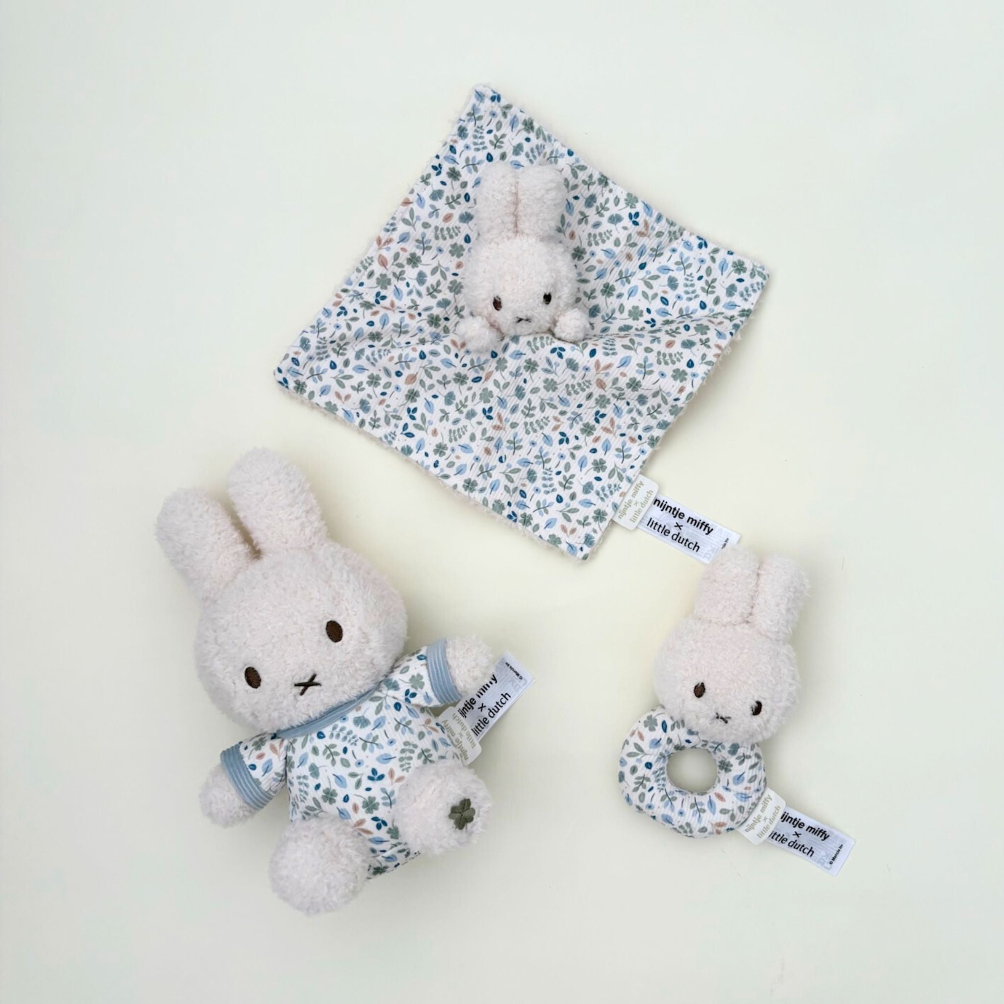 Blue Miffy plush toy with rattle and cuddle cloth, perfect for newborns and baby showers.