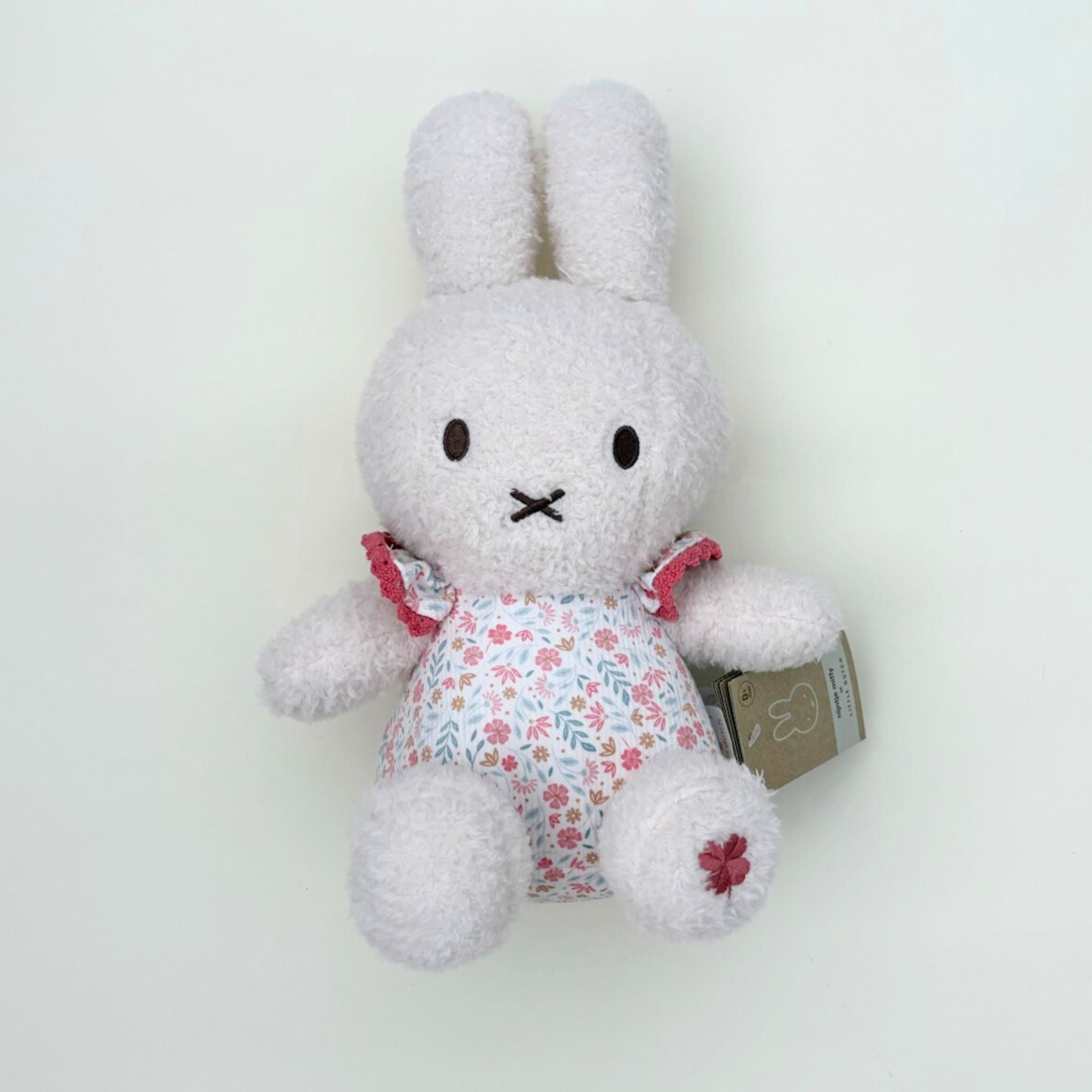 Floral Miffy plush toy with rattle in pink, perfect for newborns, baby showers, and Miffy toy lovers.