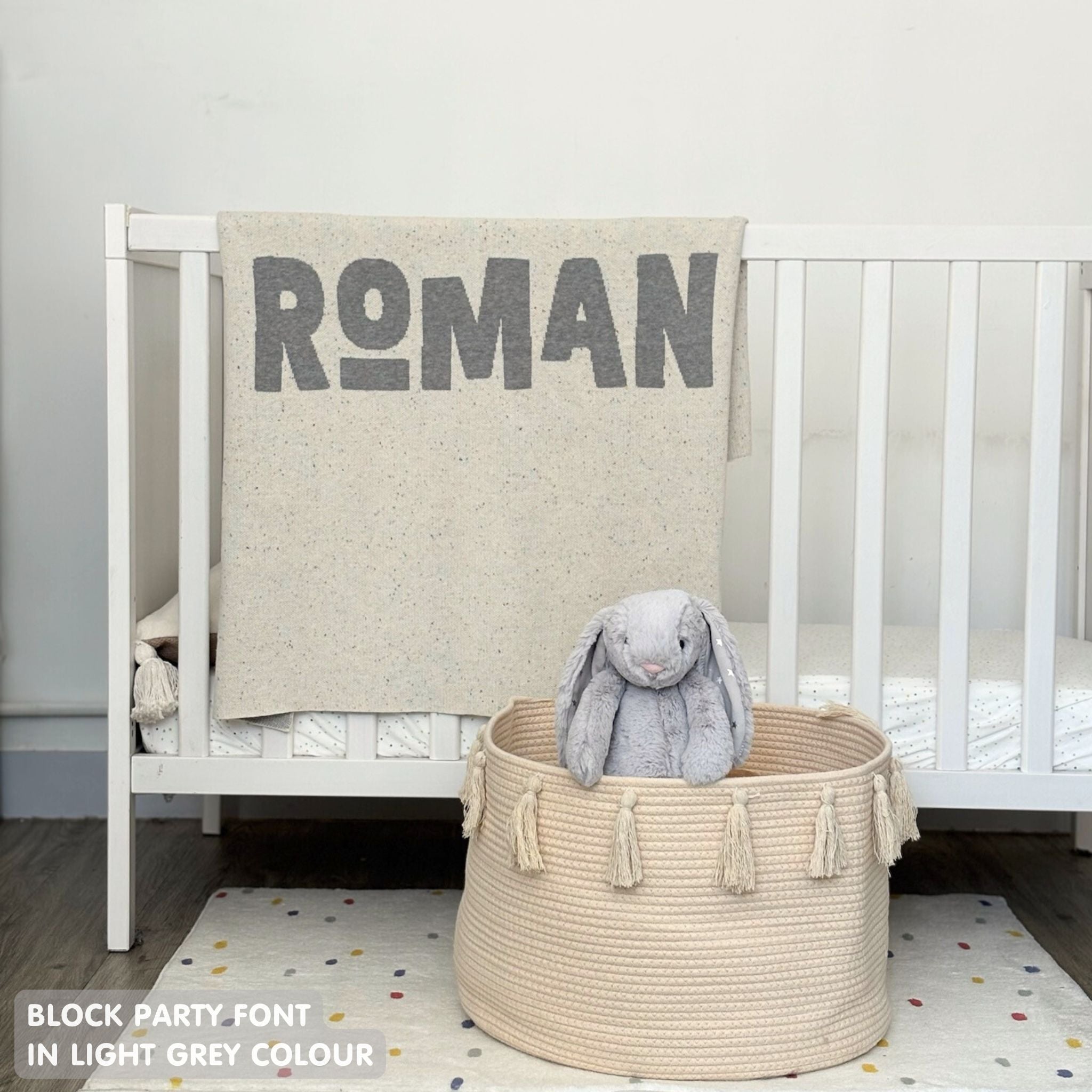 TinyBitz personalized baby name blanket, knitted in cream and light grey with a confetti pattern, perfect baby shower gift!