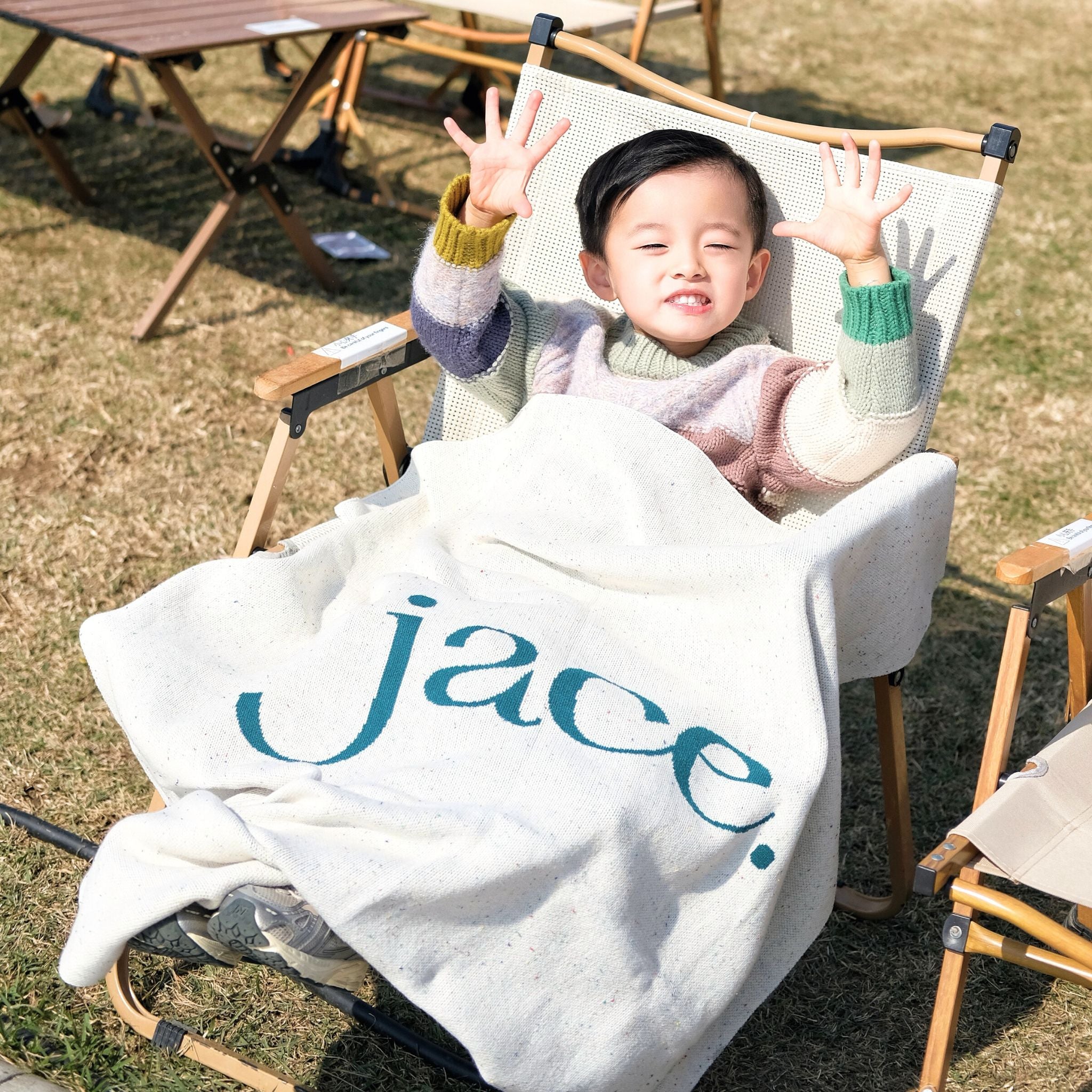 TinyBitz personalized baby name blanket, knitted in cream and teal with a confetti pattern, perfect baby shower gift!