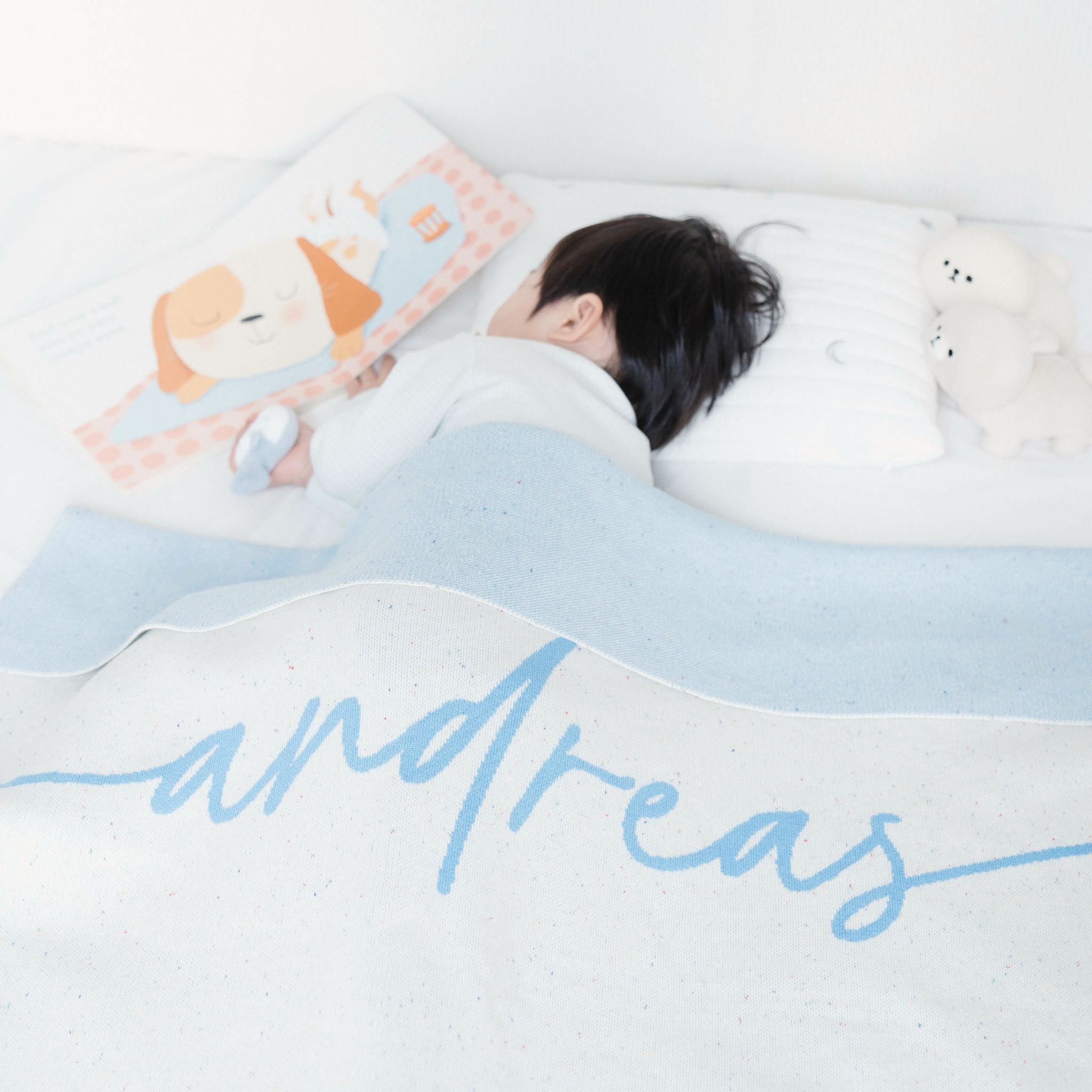 TinyBitz personalized name blanket in cream and sky blue with a confetti pattern, perfect gift for newborn babies and kids.