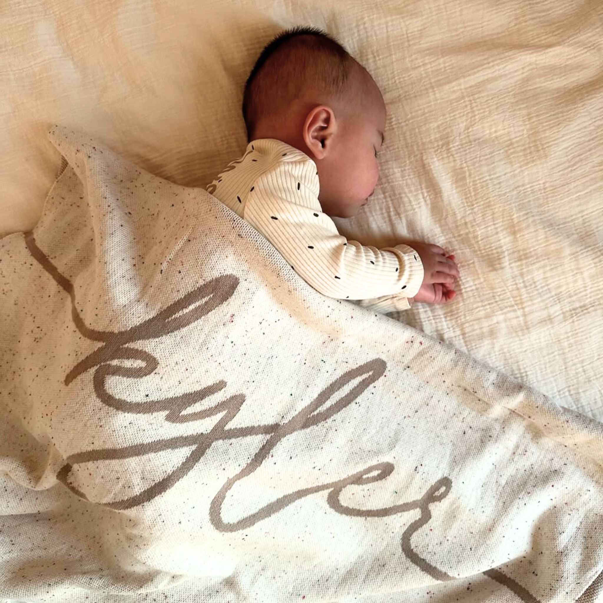 TinyBitz personalized kids knitted name blanket in cream with a confetti pattern, perfect gift for birthdays!