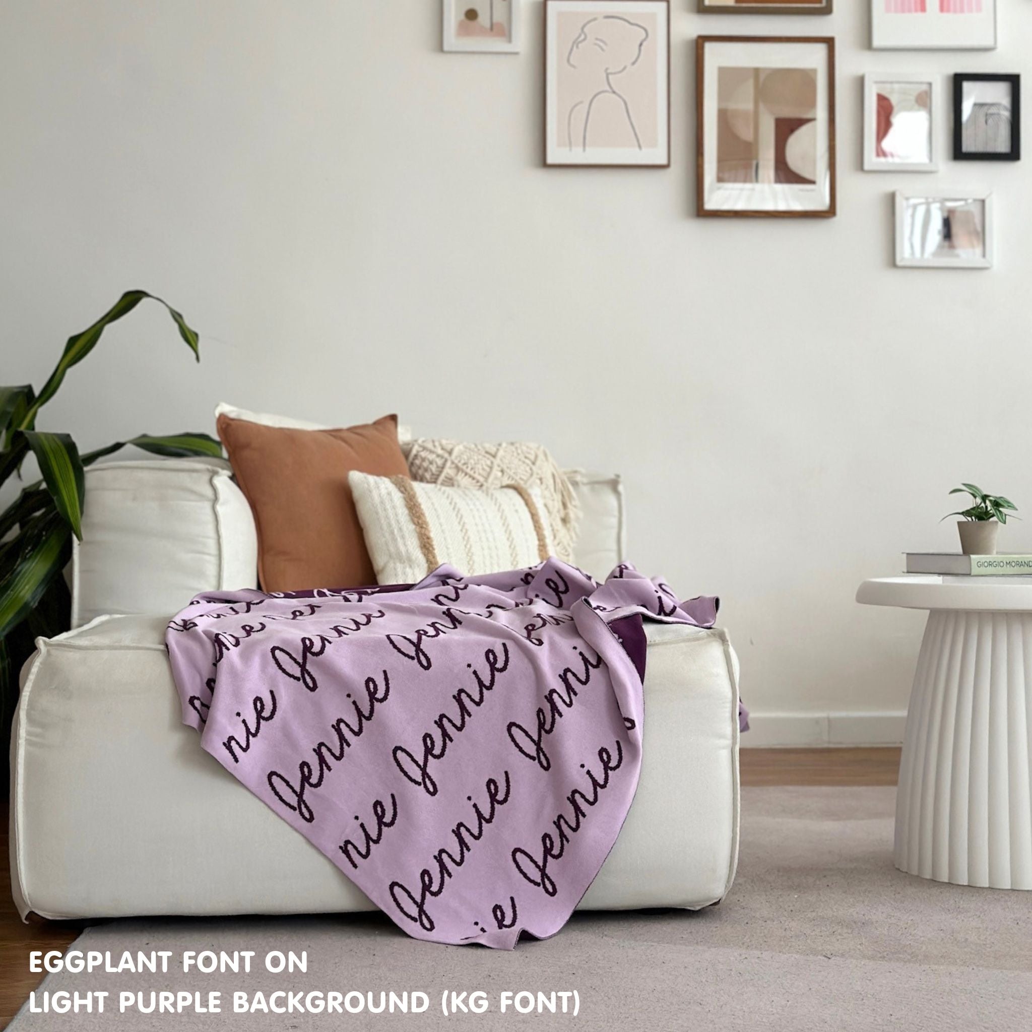 Custom name blanket draped on sofa, knitted in light purple and eggplant makes the best personalised home decor.
