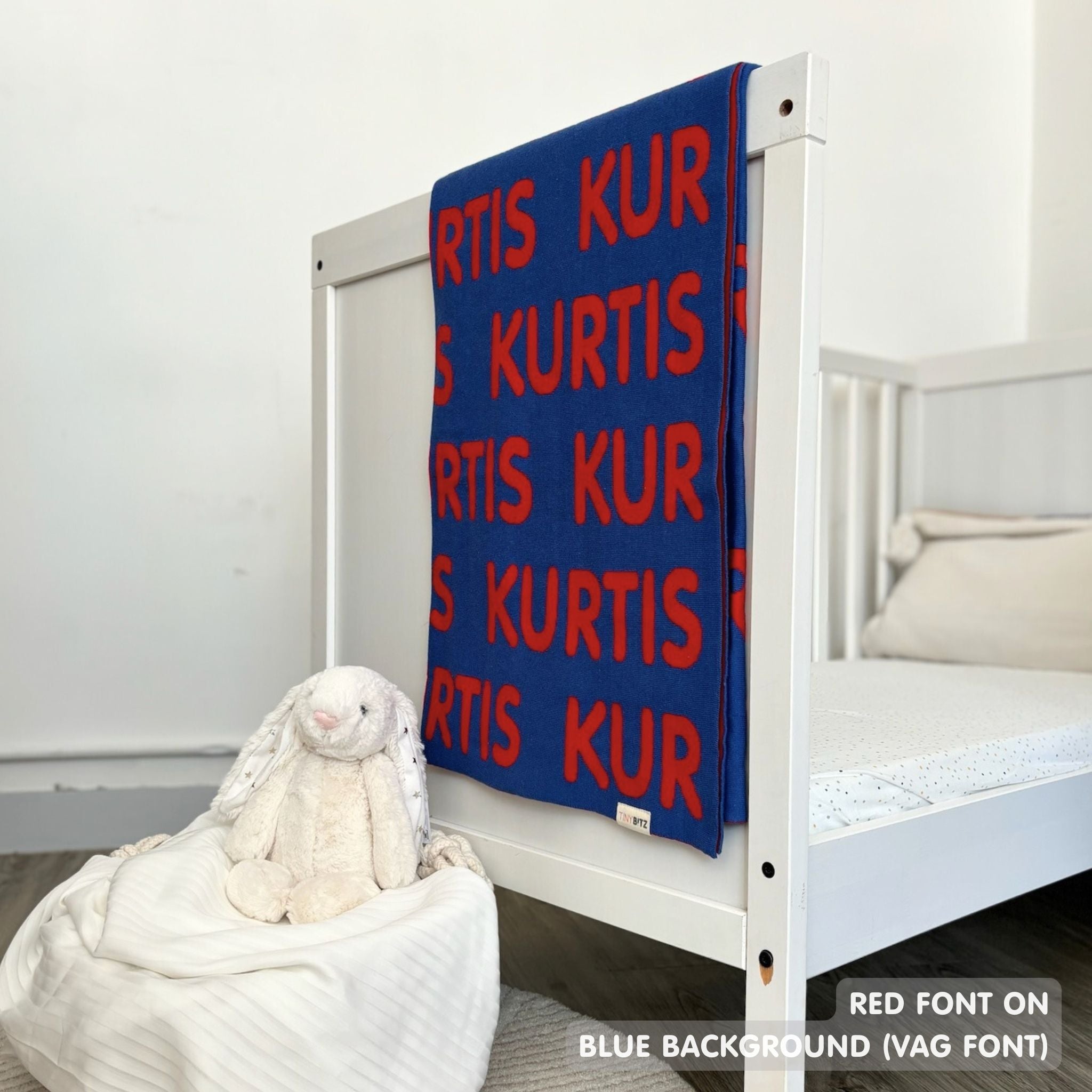 TinyBitz Personalized name blanket in blue and red, perfect gift for newborn babies.