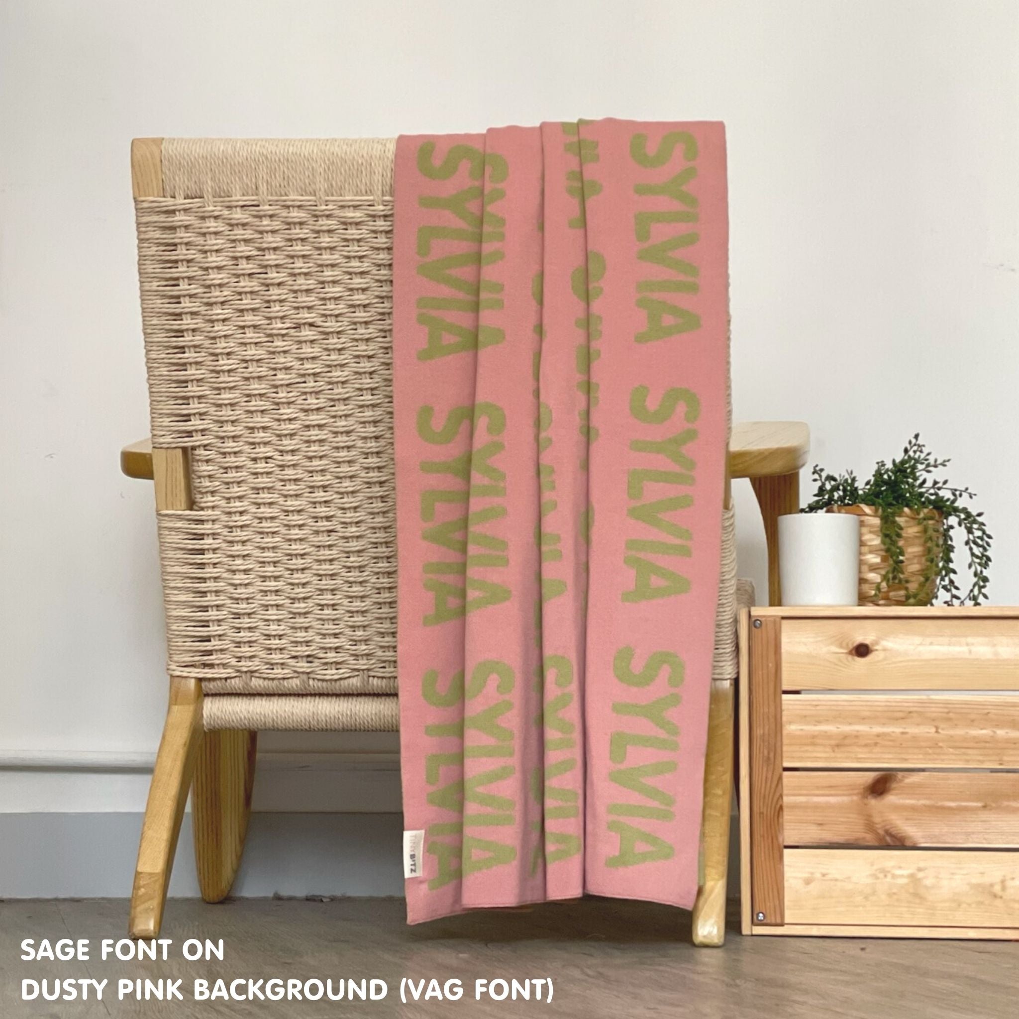 TinyBitz Personalized baby knitted name blanket in dusty pink and sage, making the best baby shower gift!