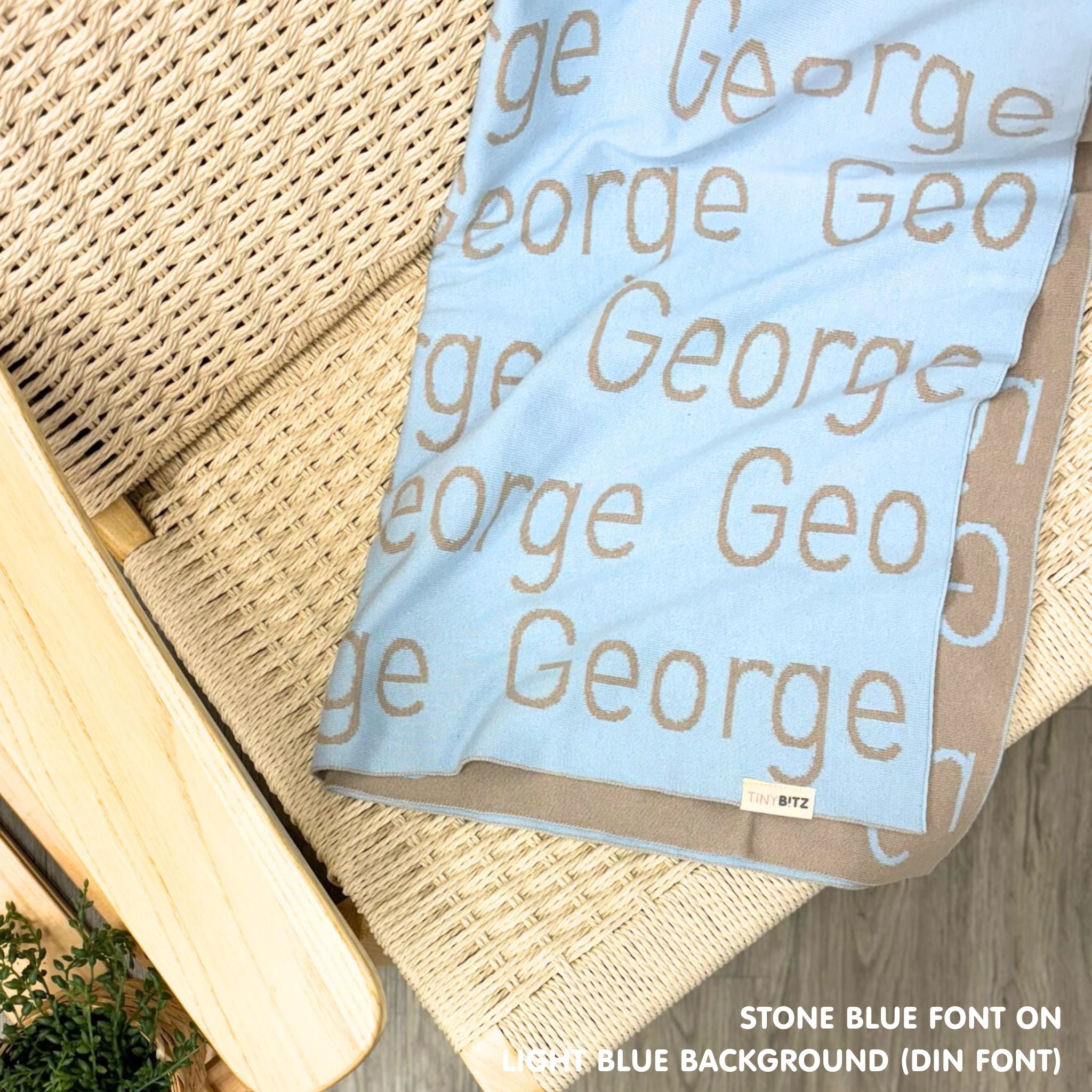 TinyBitz knitted name blanket in light blue and stone can be used to decorate your baby's room!