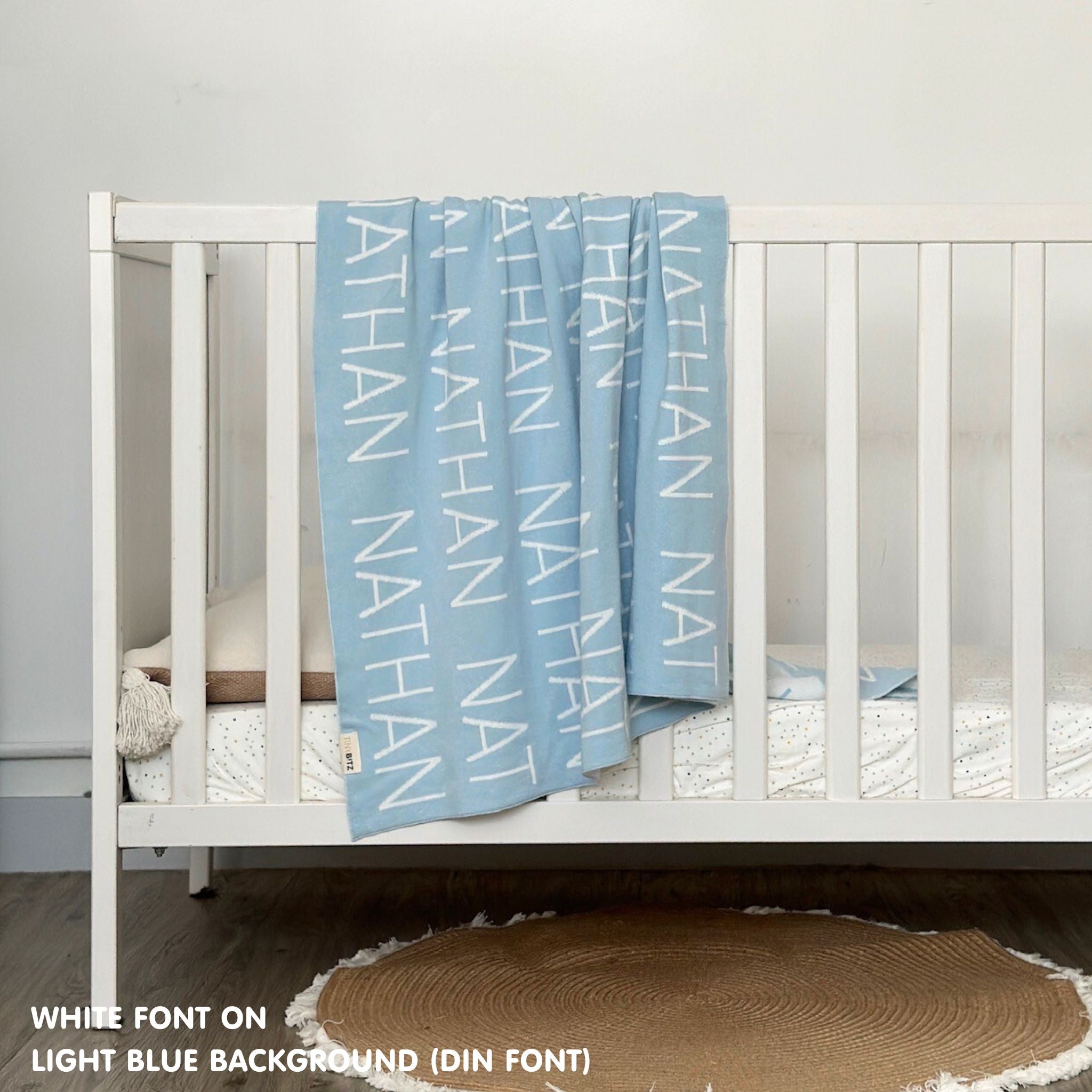 TinyBitz Personalized name blanket in light blue and white, perfect gift for newborn babies.
