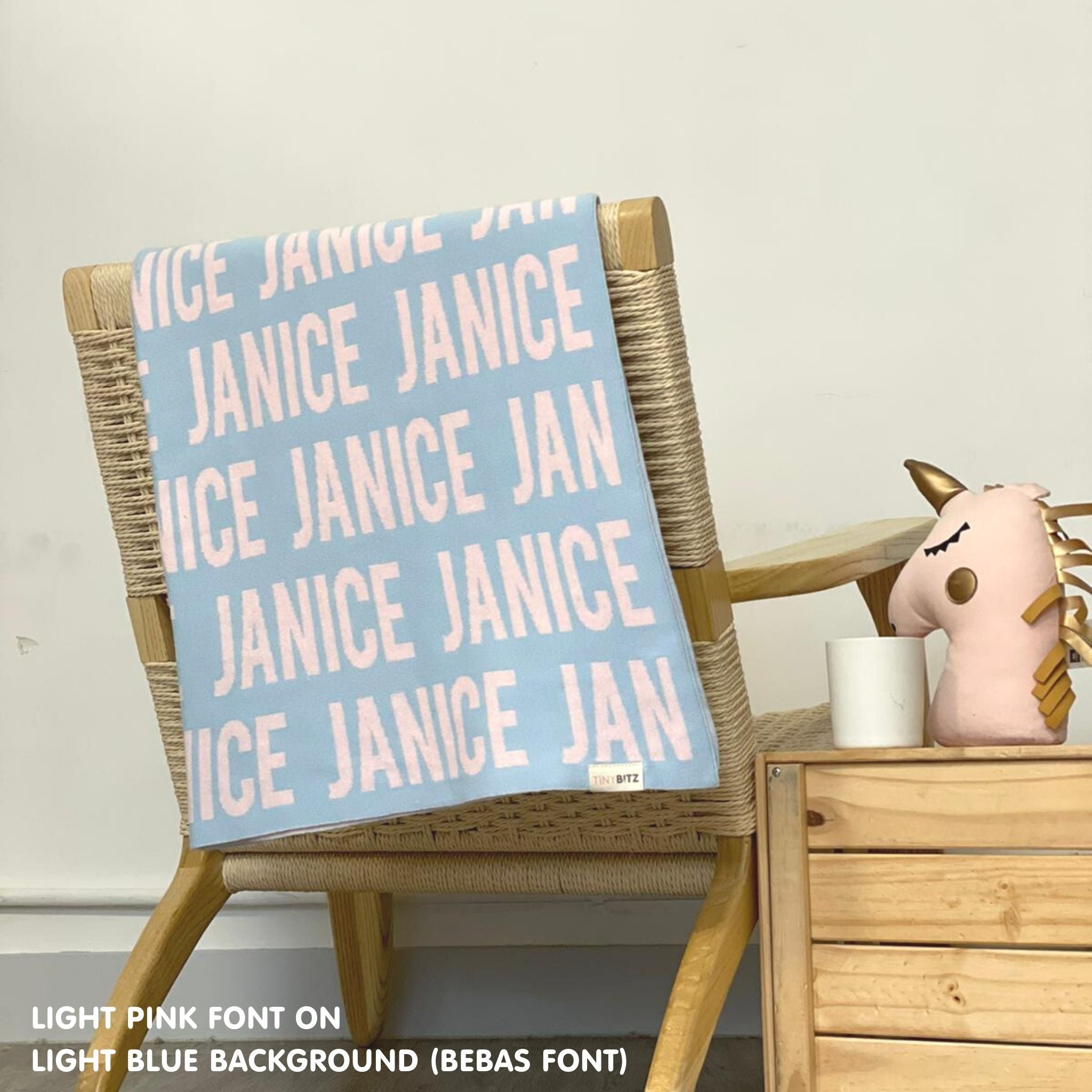 TinyBitz Personalized baby knitted name blanket in light blue and light pink, making the best baby shower gift!