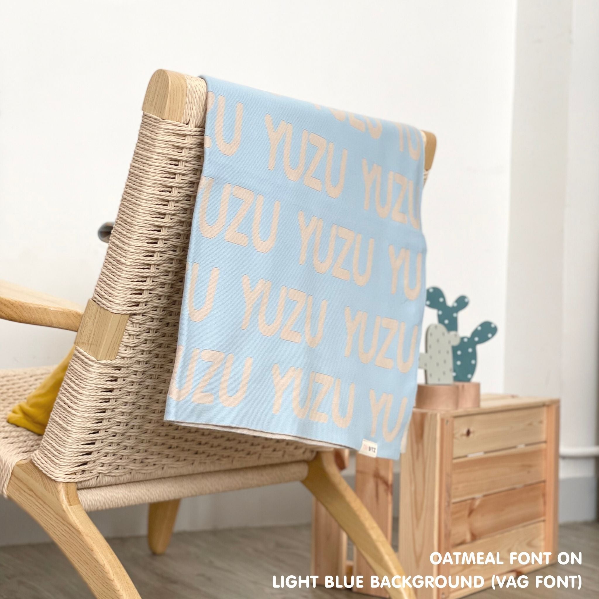 TinyBitz Custom blanket for baby knitted from cotton in light blue and oatmeal, made by TinyBitz.