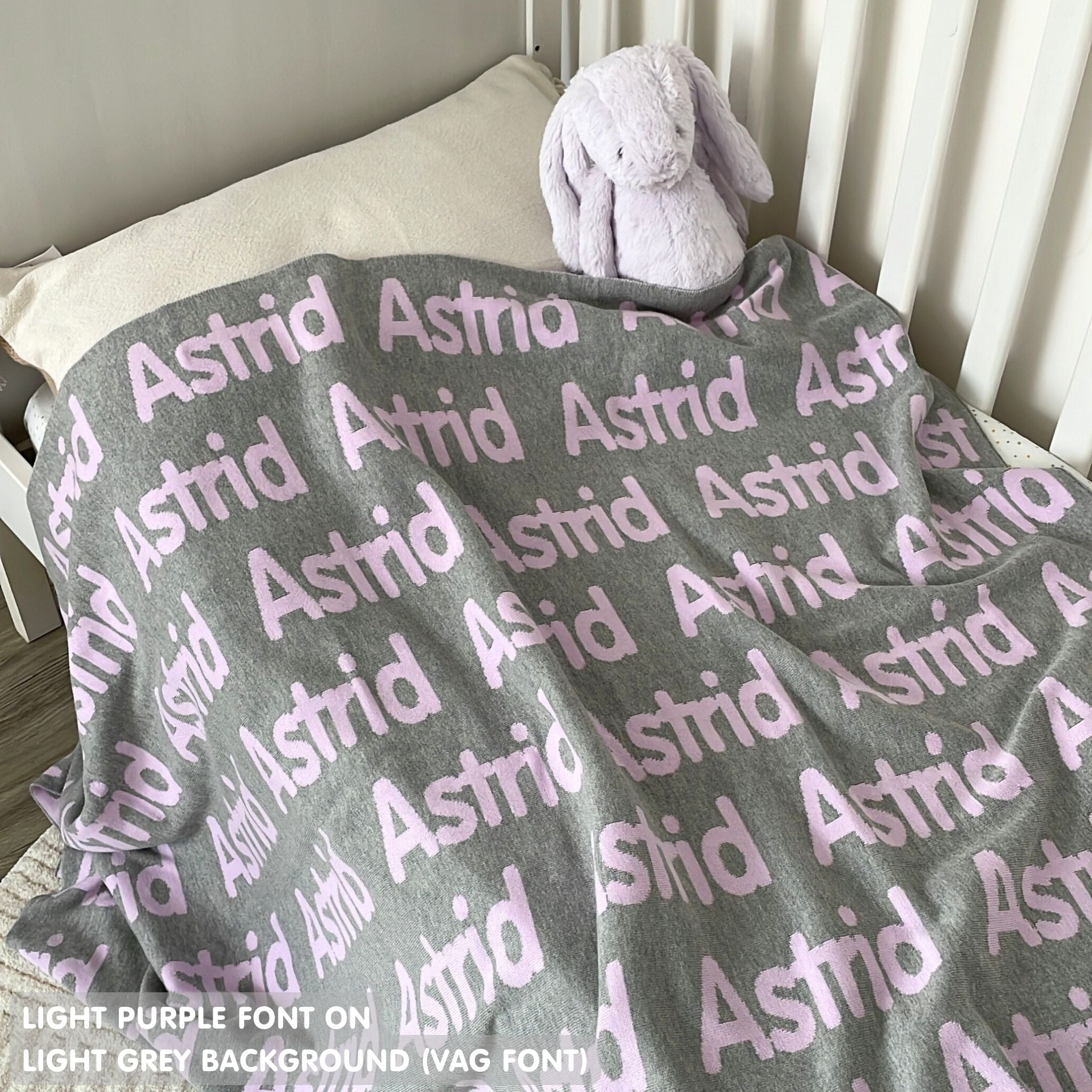 TinyBitz knitted name blanket in light grey and light purple can be used to decorate your baby's room!