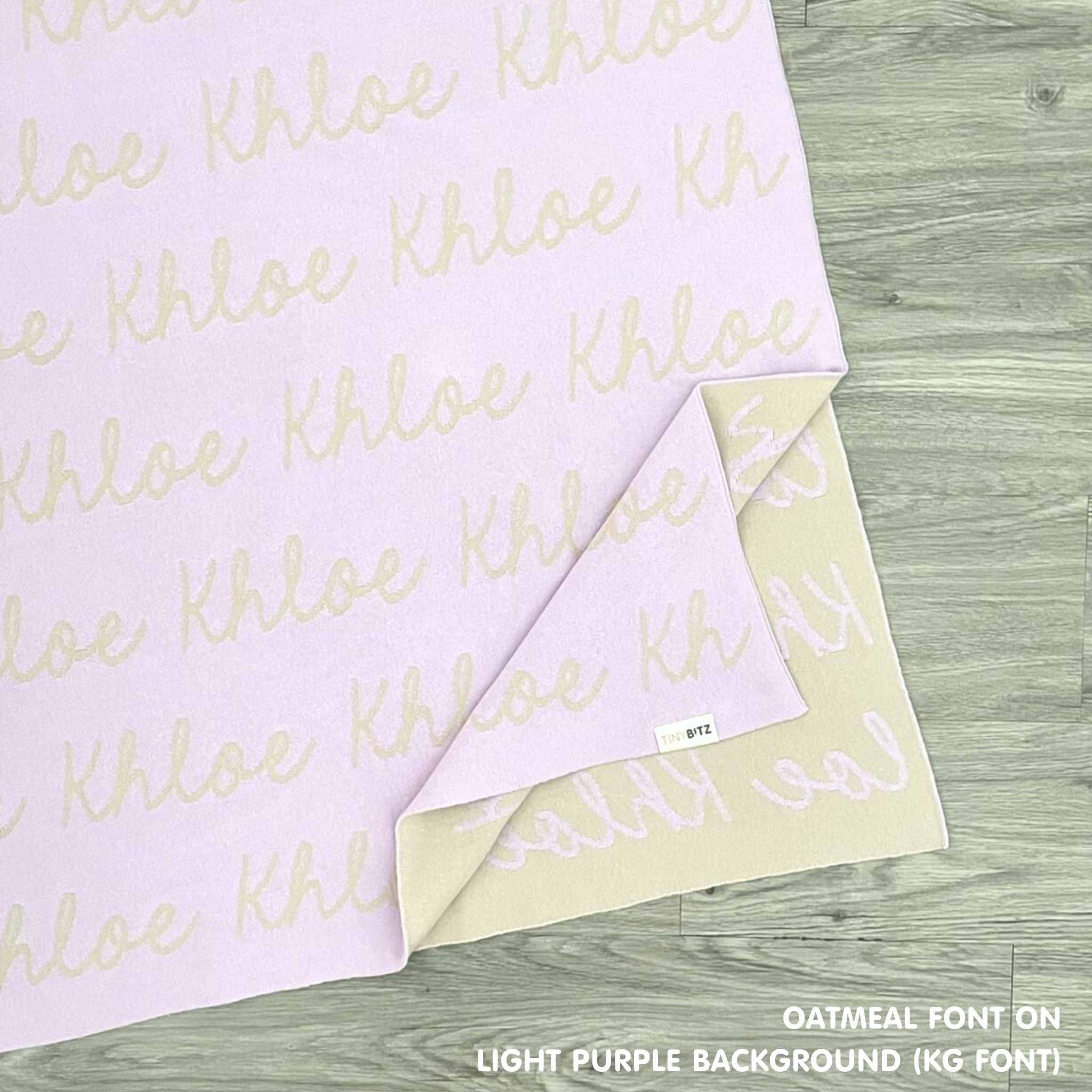 TinyBitz knitted cotton blanket in light purple and oatmeal, personalised with your own name!
