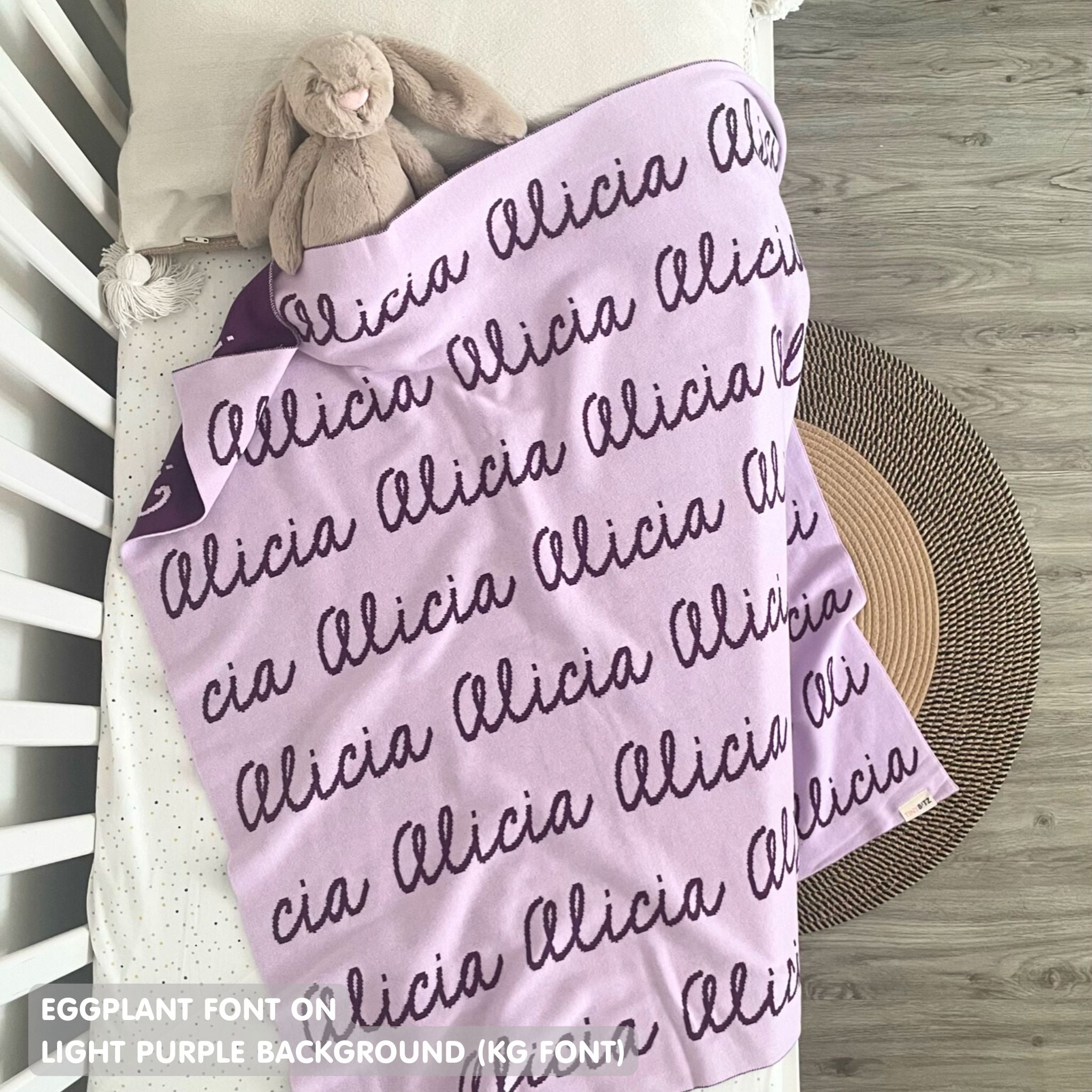 TinyBitz Personalized baby knitted name blanket in light purple and eggplant, making the best baby shower gift!