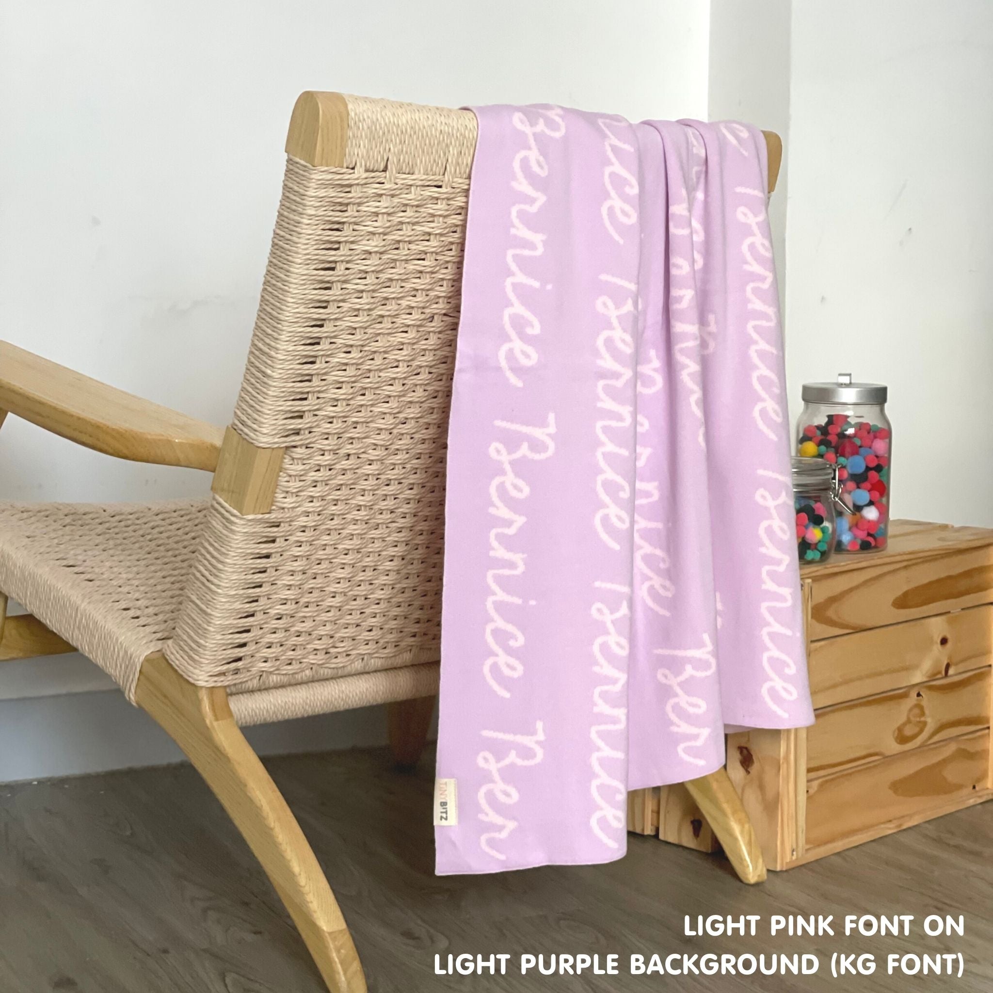 Personalised blanket for adult knitted from cotton in light purple and light pink, custom made by TinyBitz.