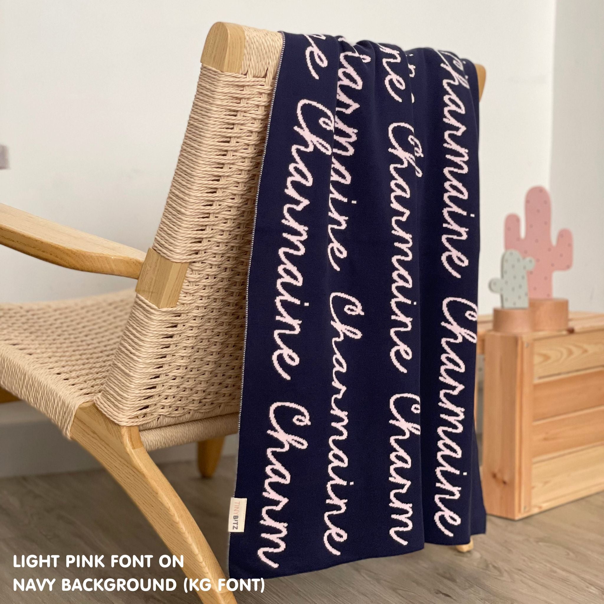 Custom cotton blanket as a gift for her, knitted in navy and light pink by TinyBitz.