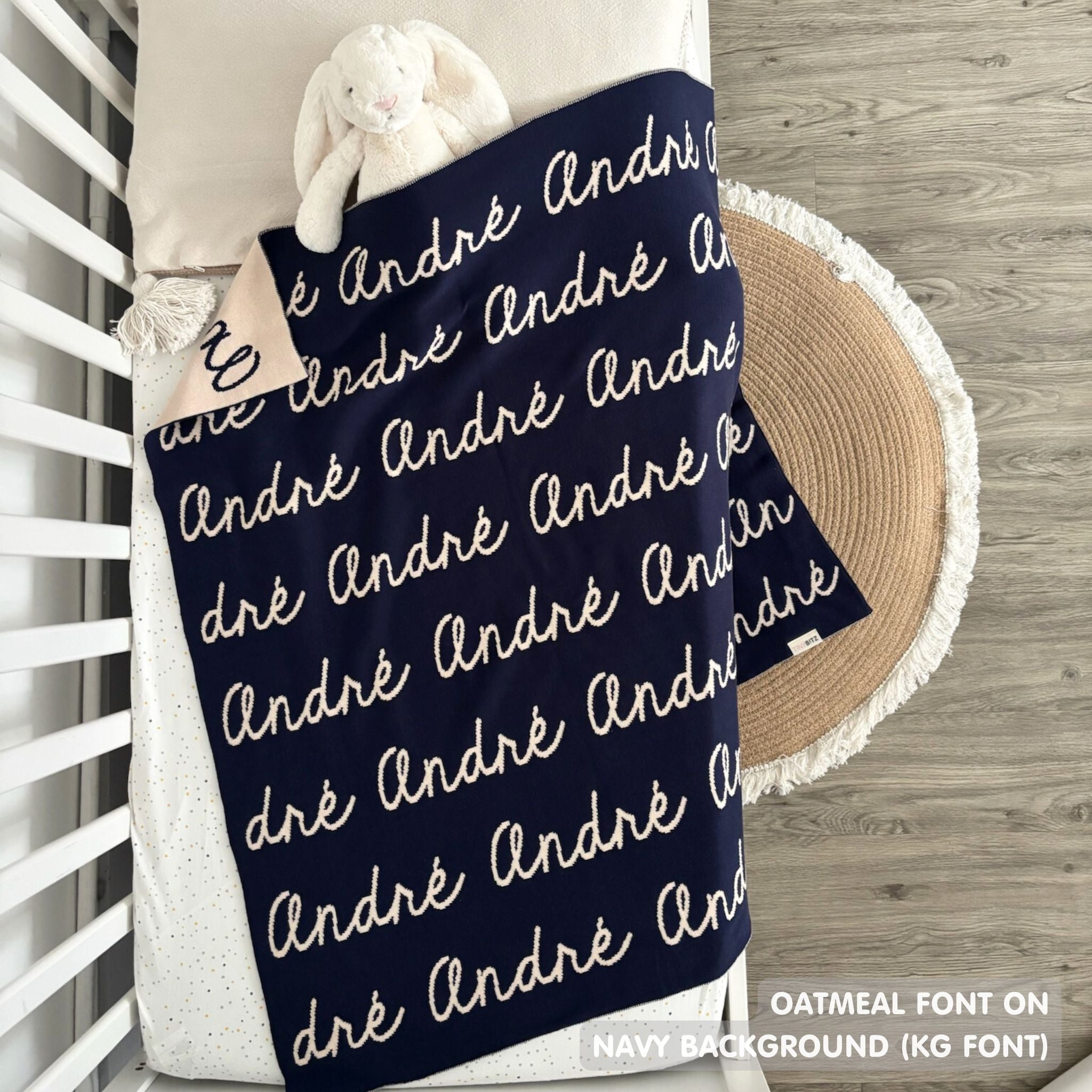 TinyBitz knitted name blanket in navy and oatmeal can be used to decorate your baby's room!