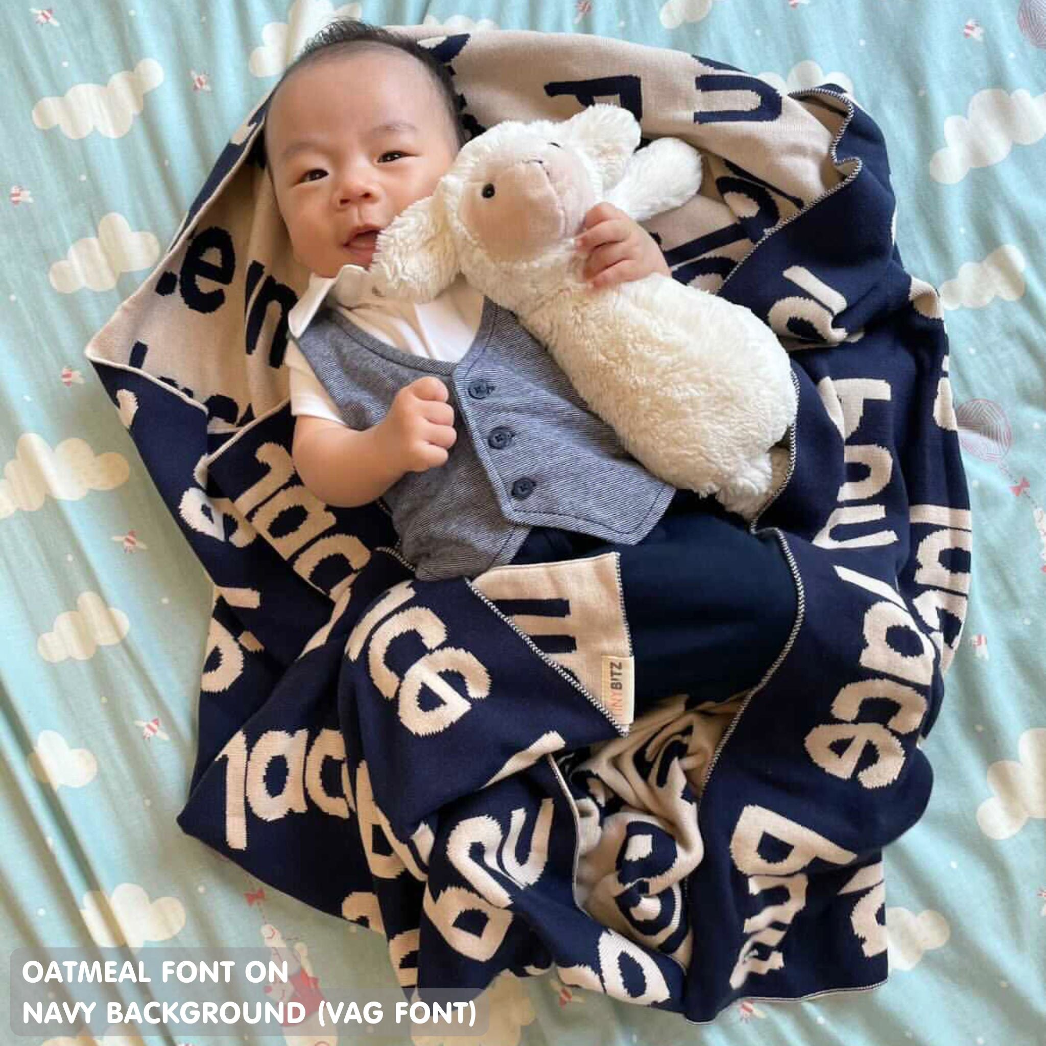 TinyBitz Personalized name blanket in navy and oatmeal, perfect gift for newborn babies.