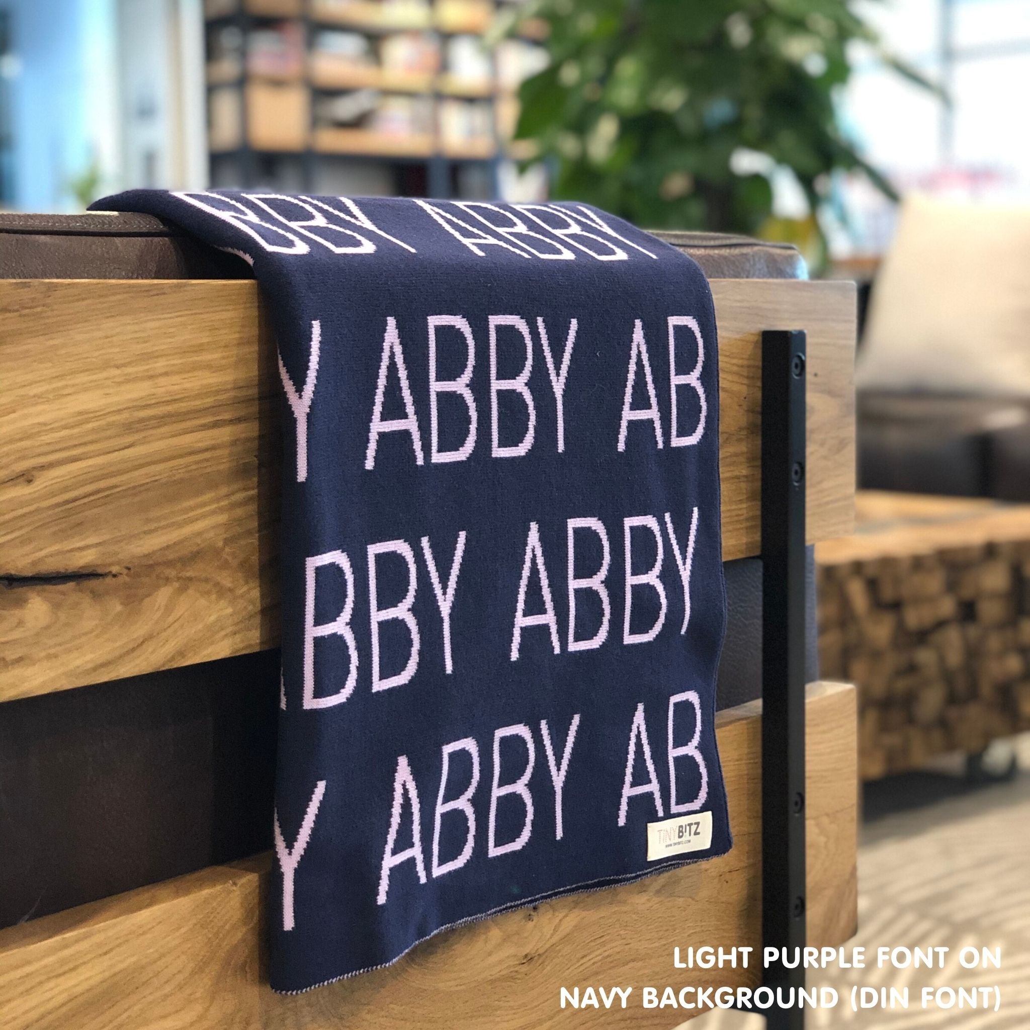 TinyBitz Custom blanket for baby girls knitted from cotton in navy and light purple, made by TinyBitz.