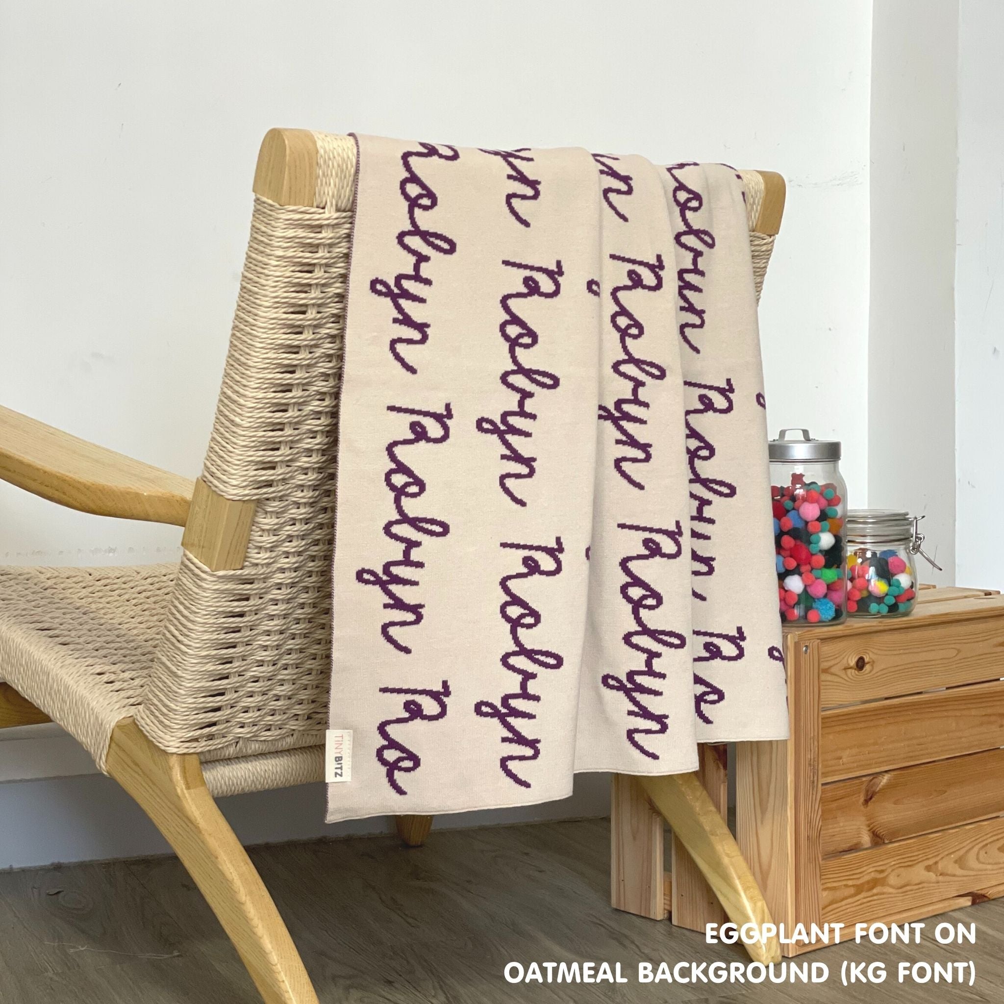 TinyBitz Custom blanket for baby girls knitted from cotton in oatmeal and eggplant, made by TinyBitz.