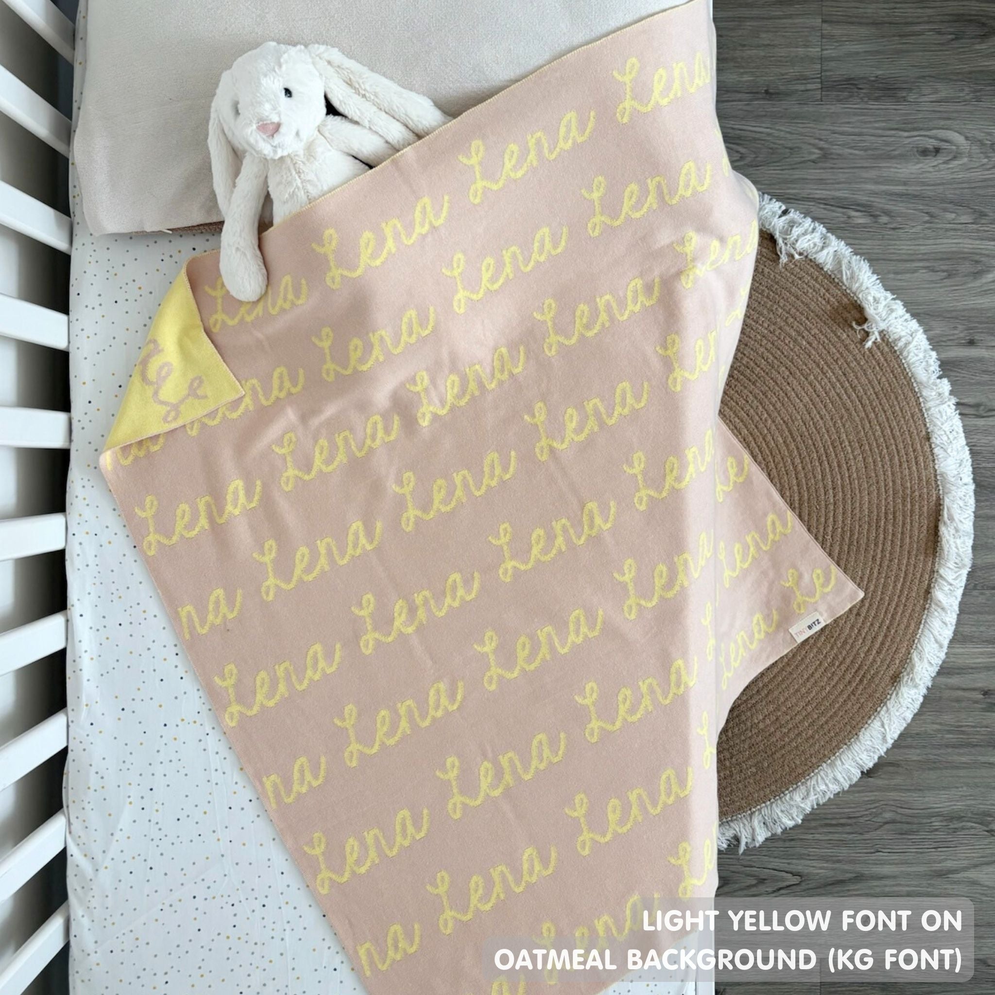 TinyBitz Personalized name blanket in oatmeal and light yellow, perfect gift for newborn babies.