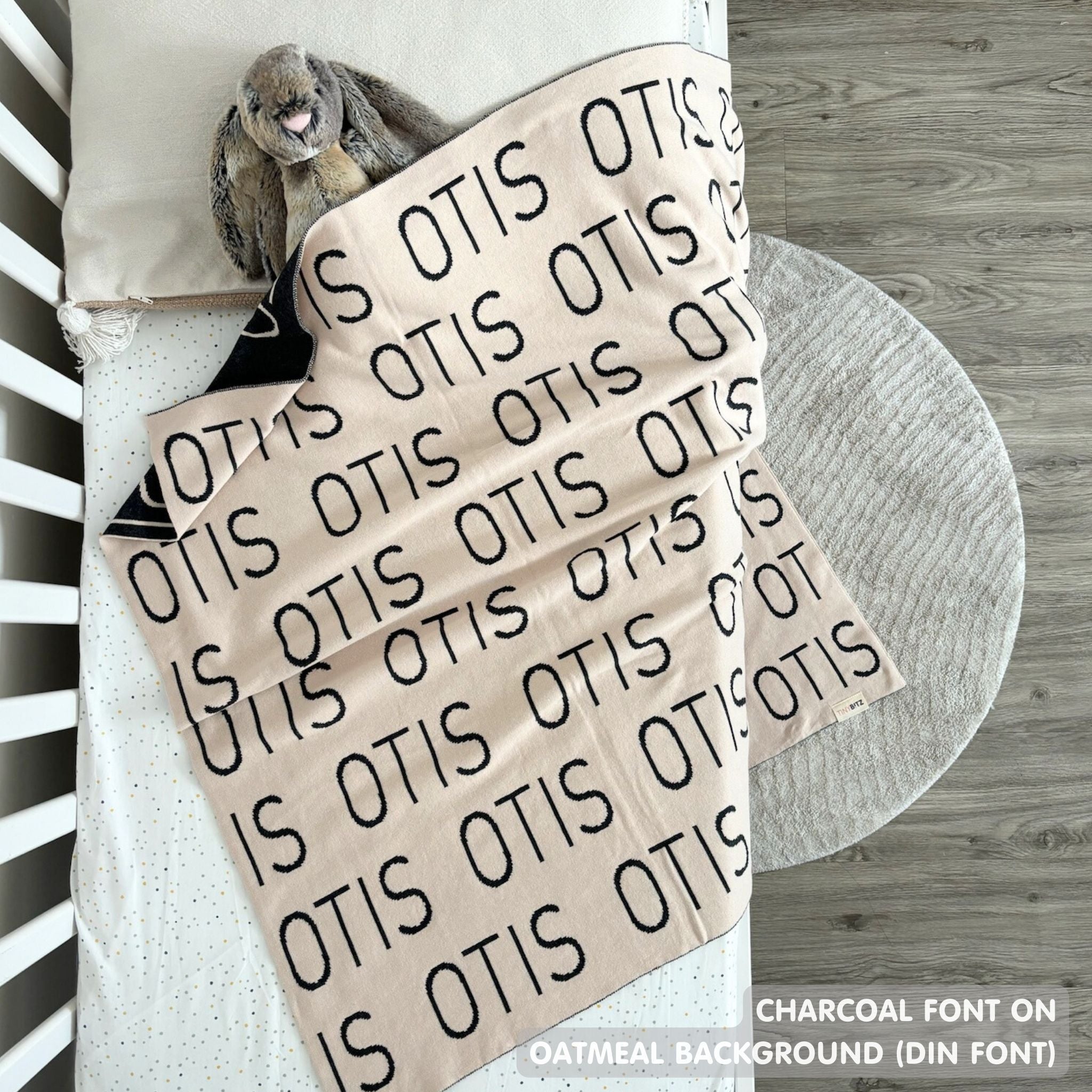 TinyBitz Personalized baby knitted name blanket in oatmeal and charcoal, making the best baby shower gift!