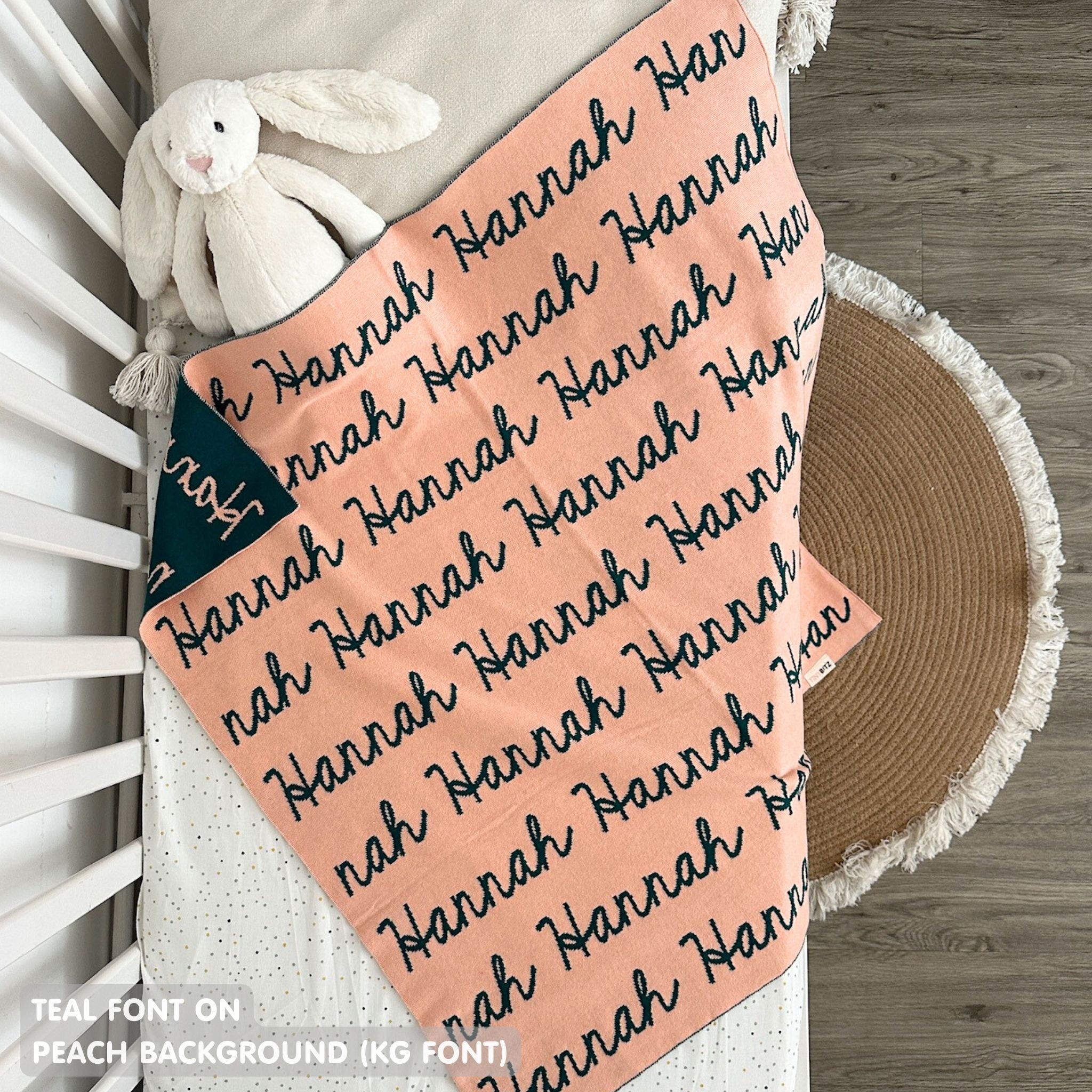 TinyBitz Personalized name blanket in peach and teal, perfect gift for newborn babies.