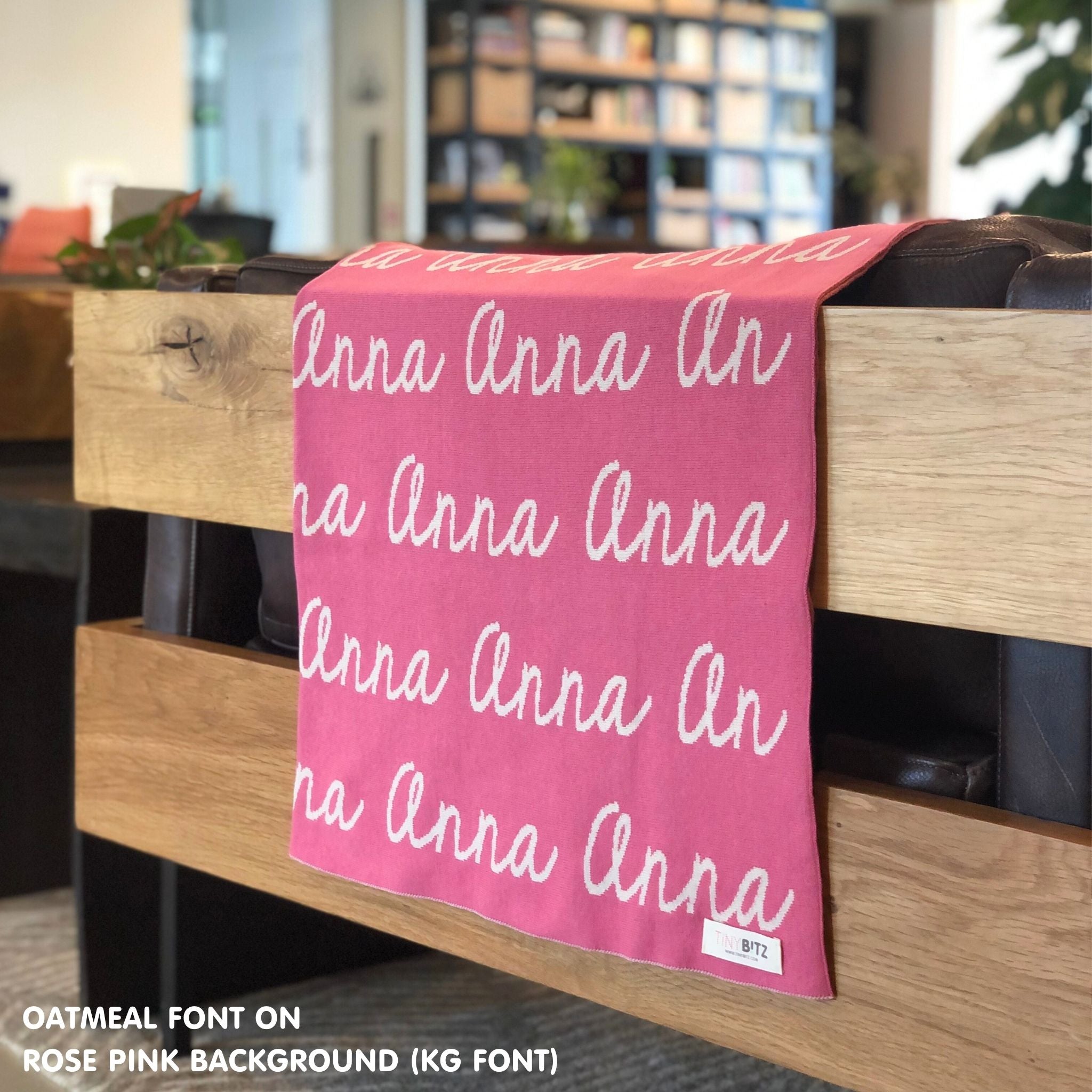 Customisable blanket with adult's name knitted in rose pink and oatmeal, personalized by TinyBitz.