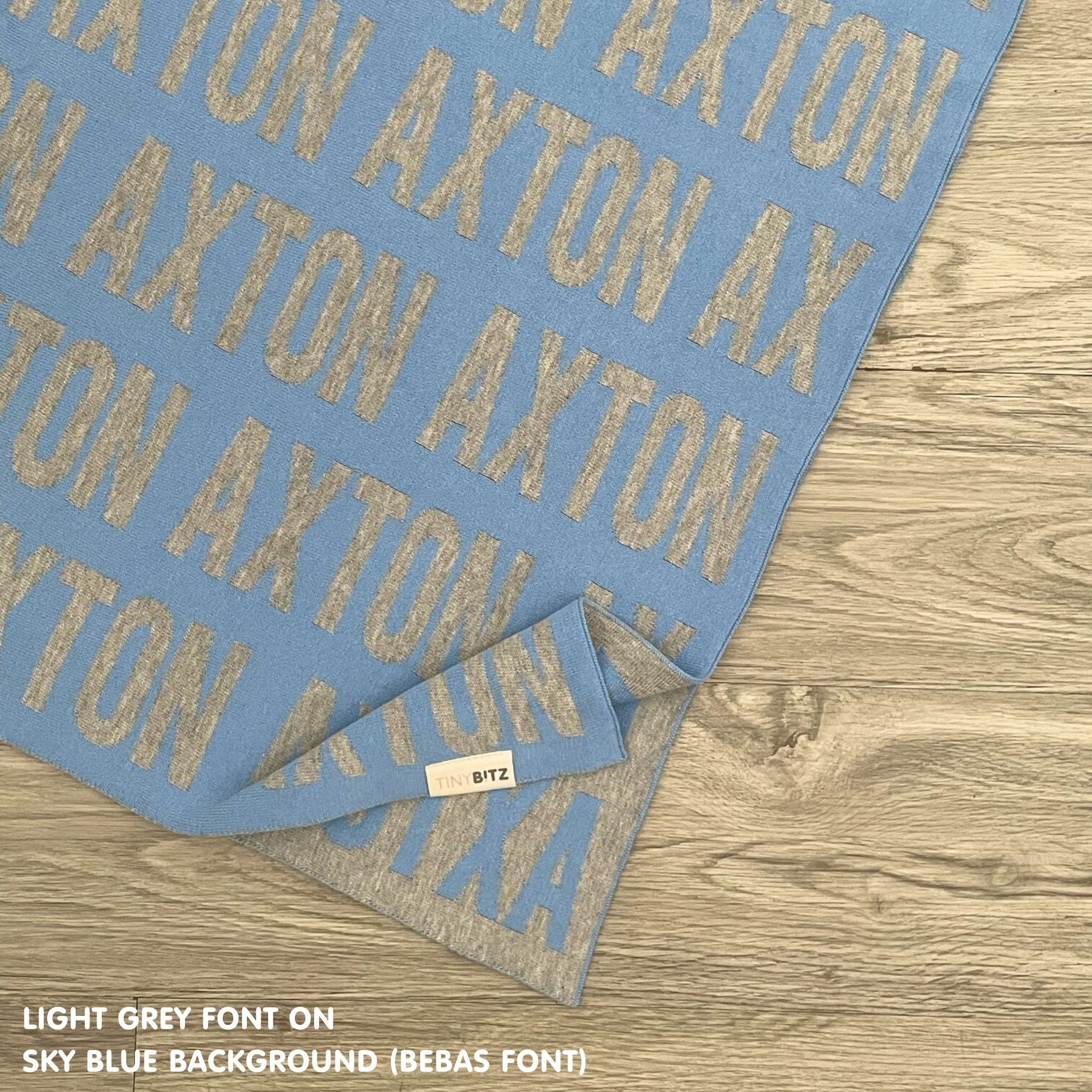 Custom cotton blanket as a gift for him, knitted in sky blue and light grey by TinyBitz.