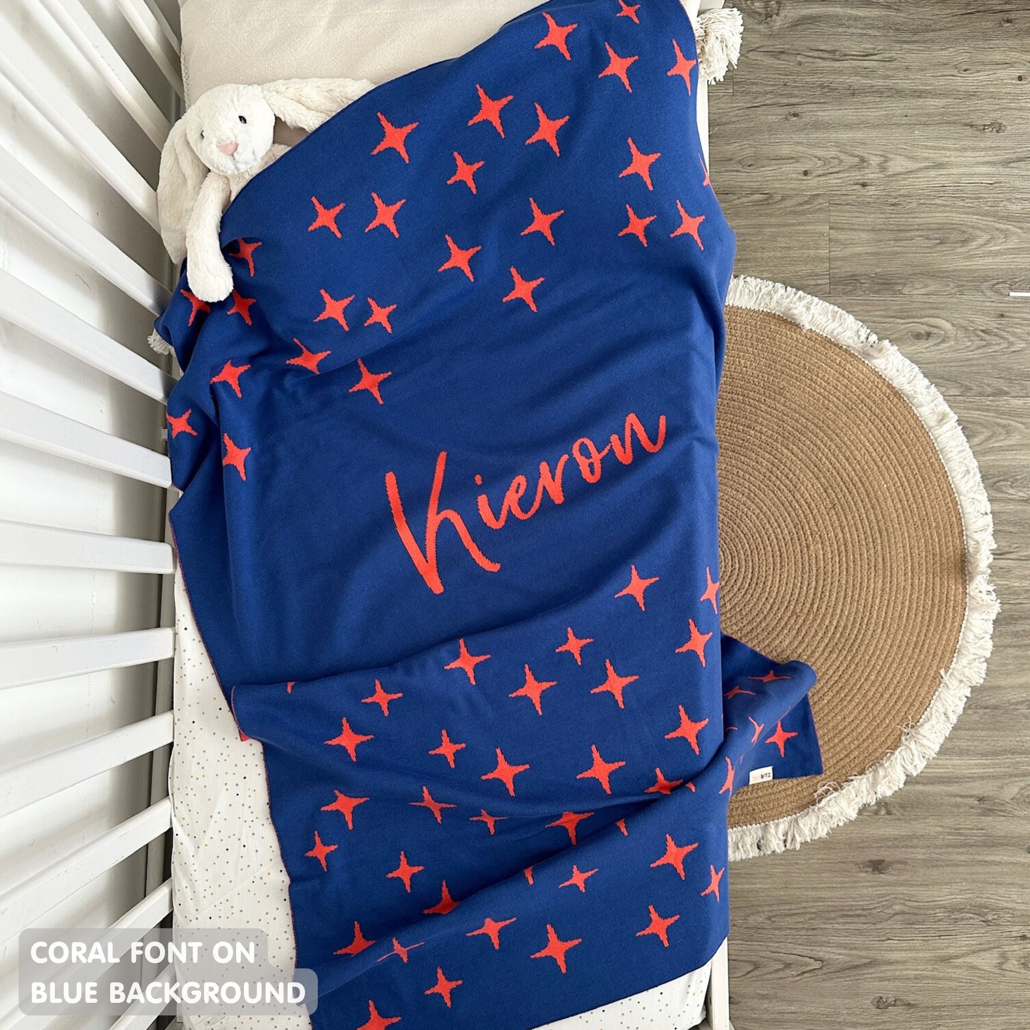 TinyBitz personalized baby name blanket, knitted in blue and coral with a twinkles pattern, perfect baby shower gift!