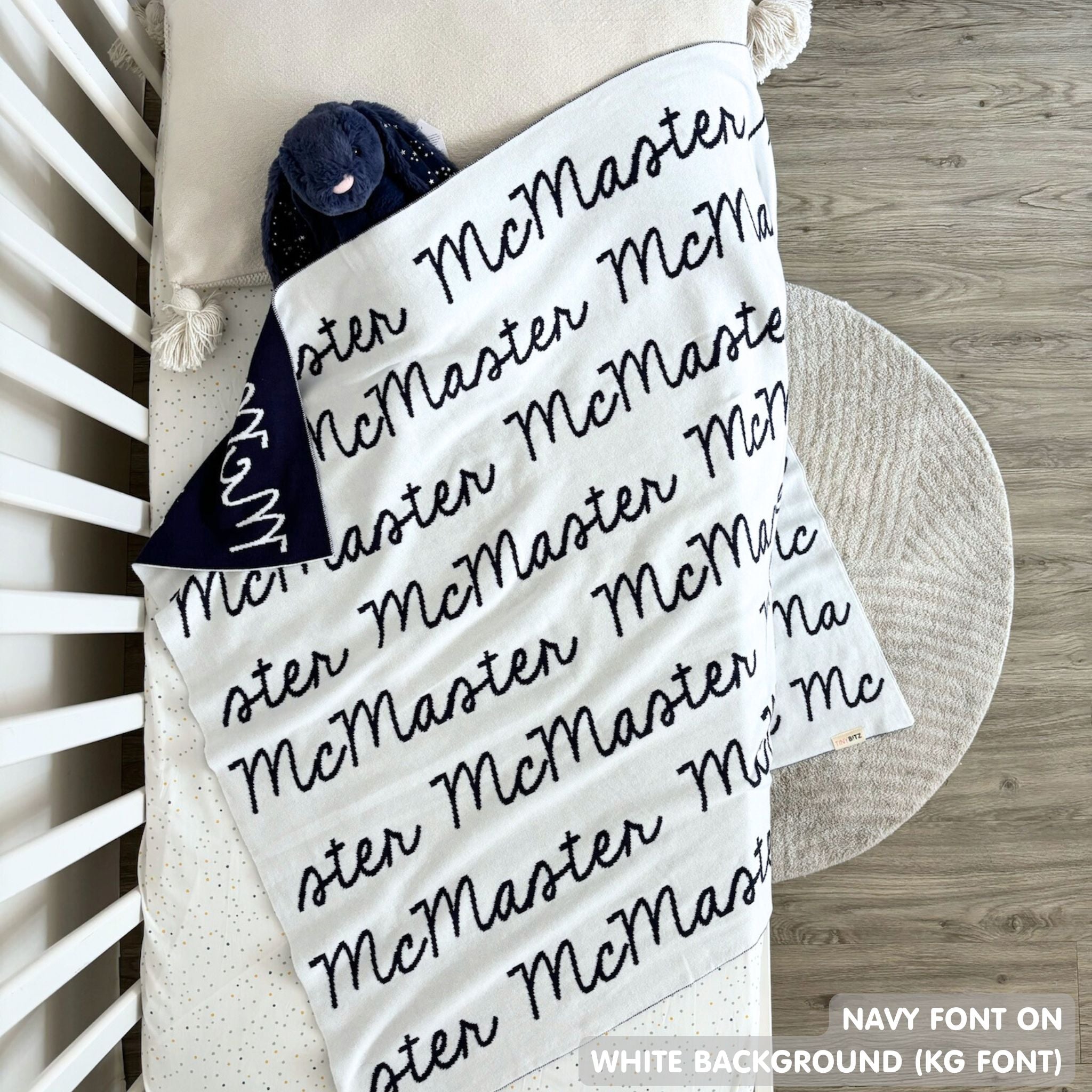 TinyBitz Personalized name blanket in white and navy, perfect gift for newborn babies.