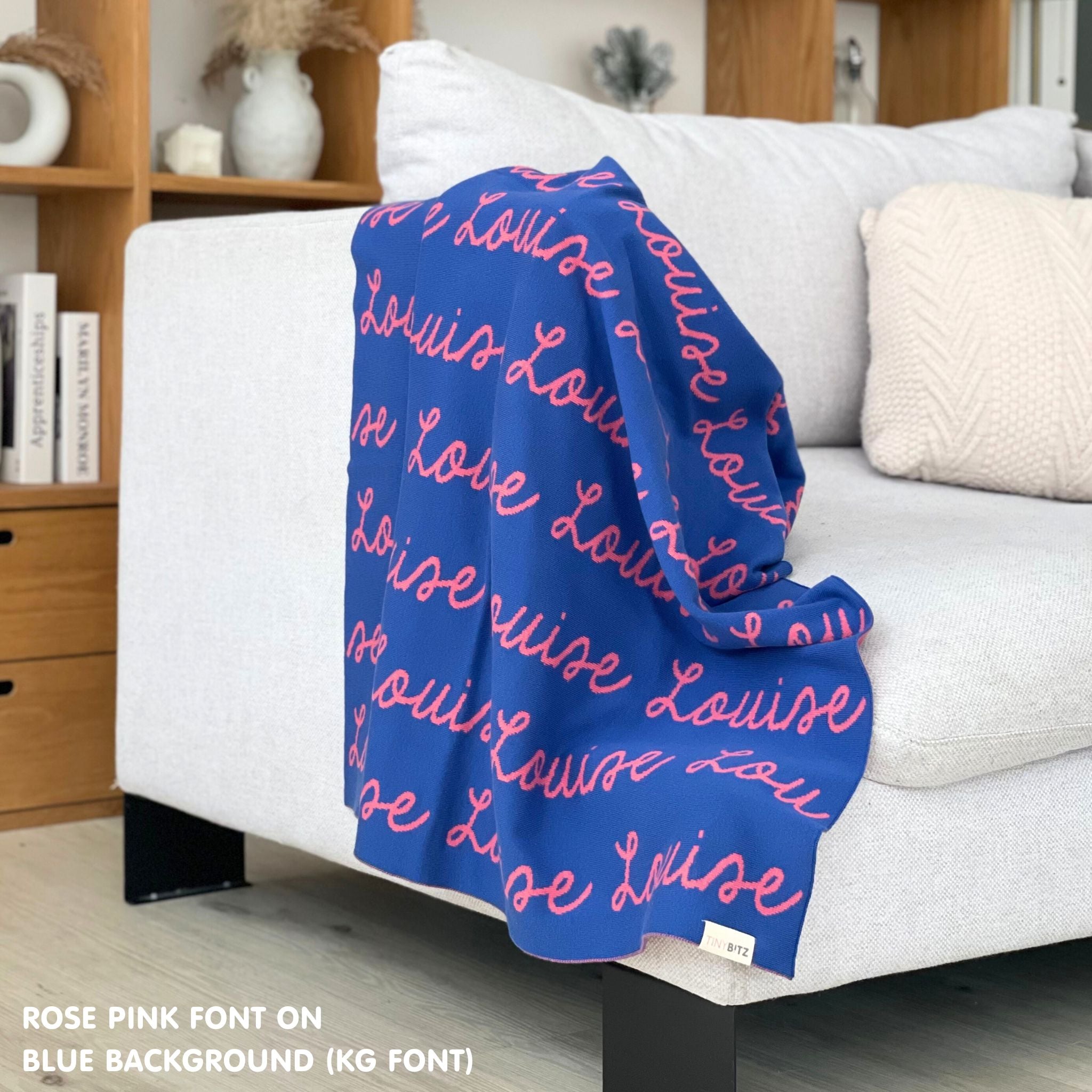 TinyBitz Kids Blanket in blue and rose pink, personalized with child's name and made from 100% cotton.