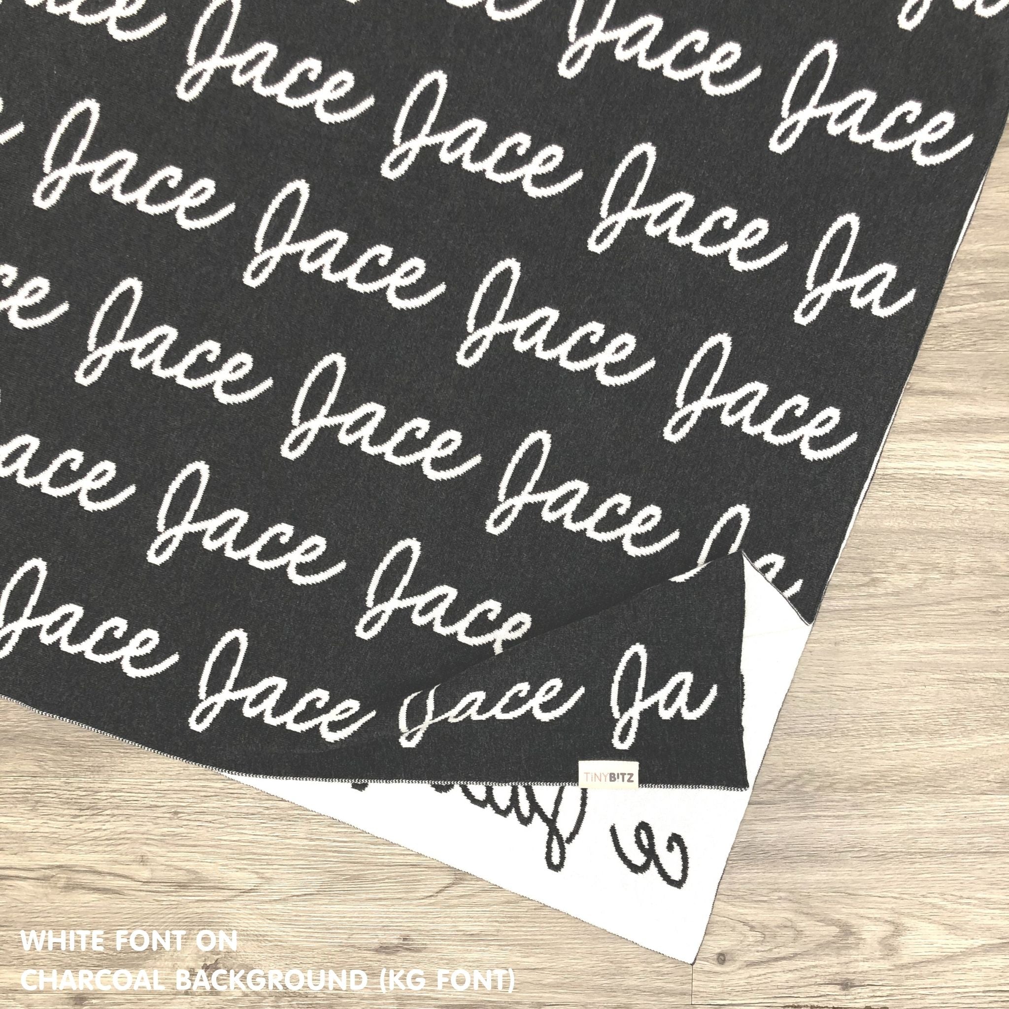 Custom cotton blanket for boys in charcoal and white, personalized by TinyBitz.