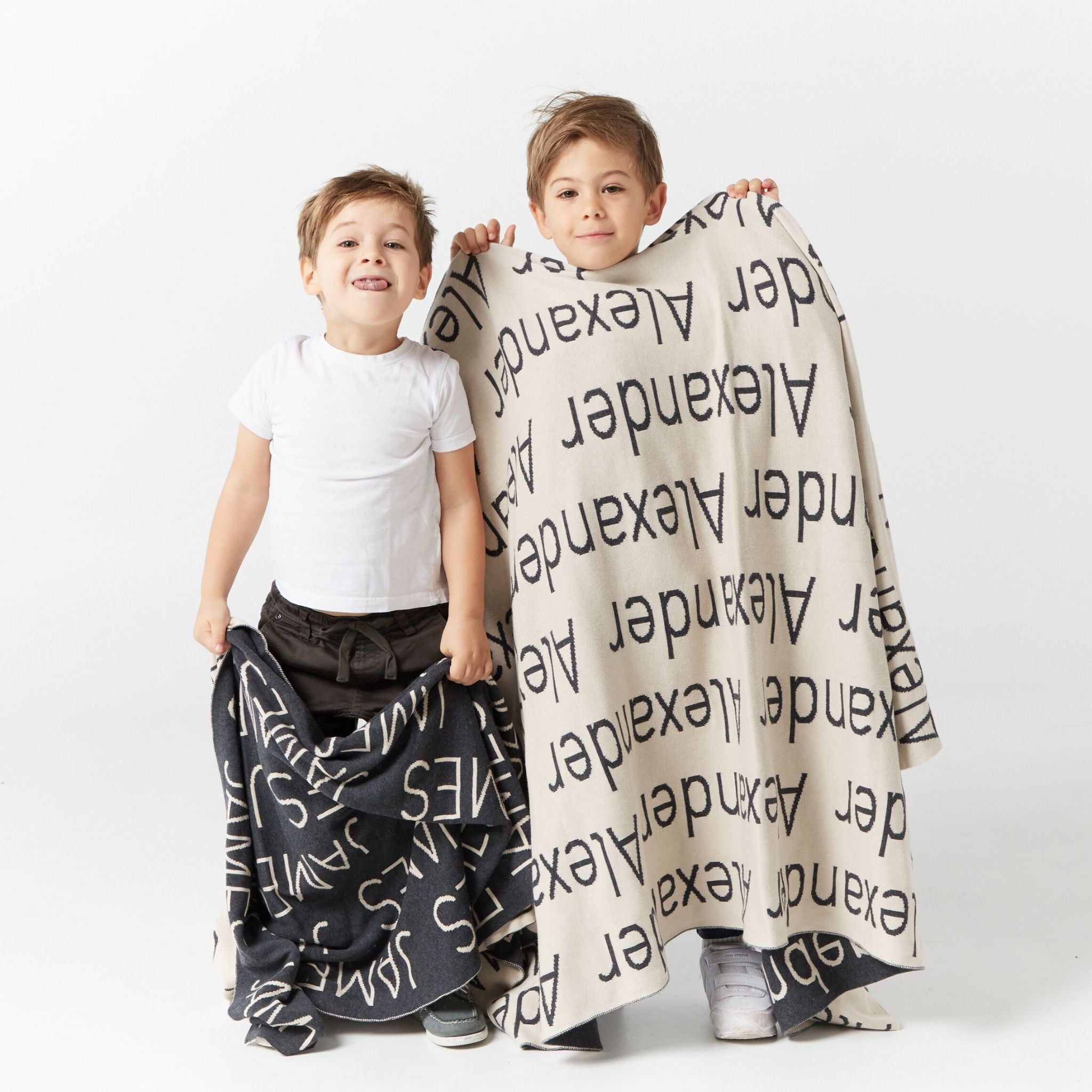 TinyBitz Kids Blanket in charcoal and oatmeal, personalized with child's name and made from 100% cotton.
