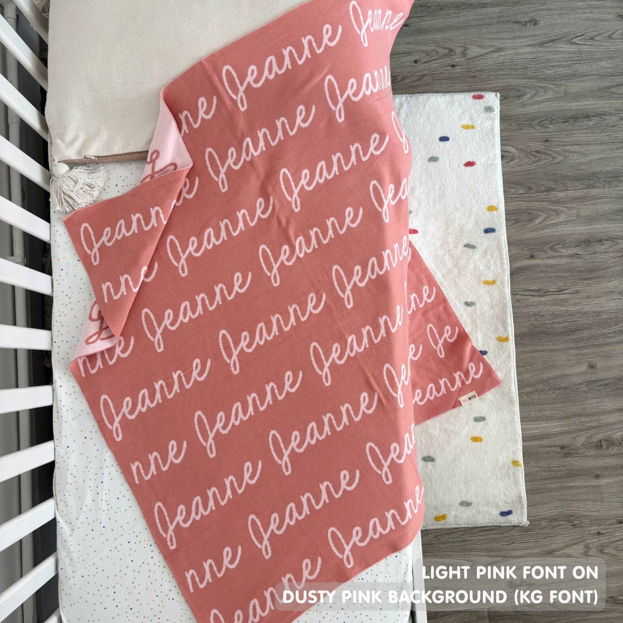 Custom cotton blanket for girls in dusty pink and light pink, personalized by TinyBitz.