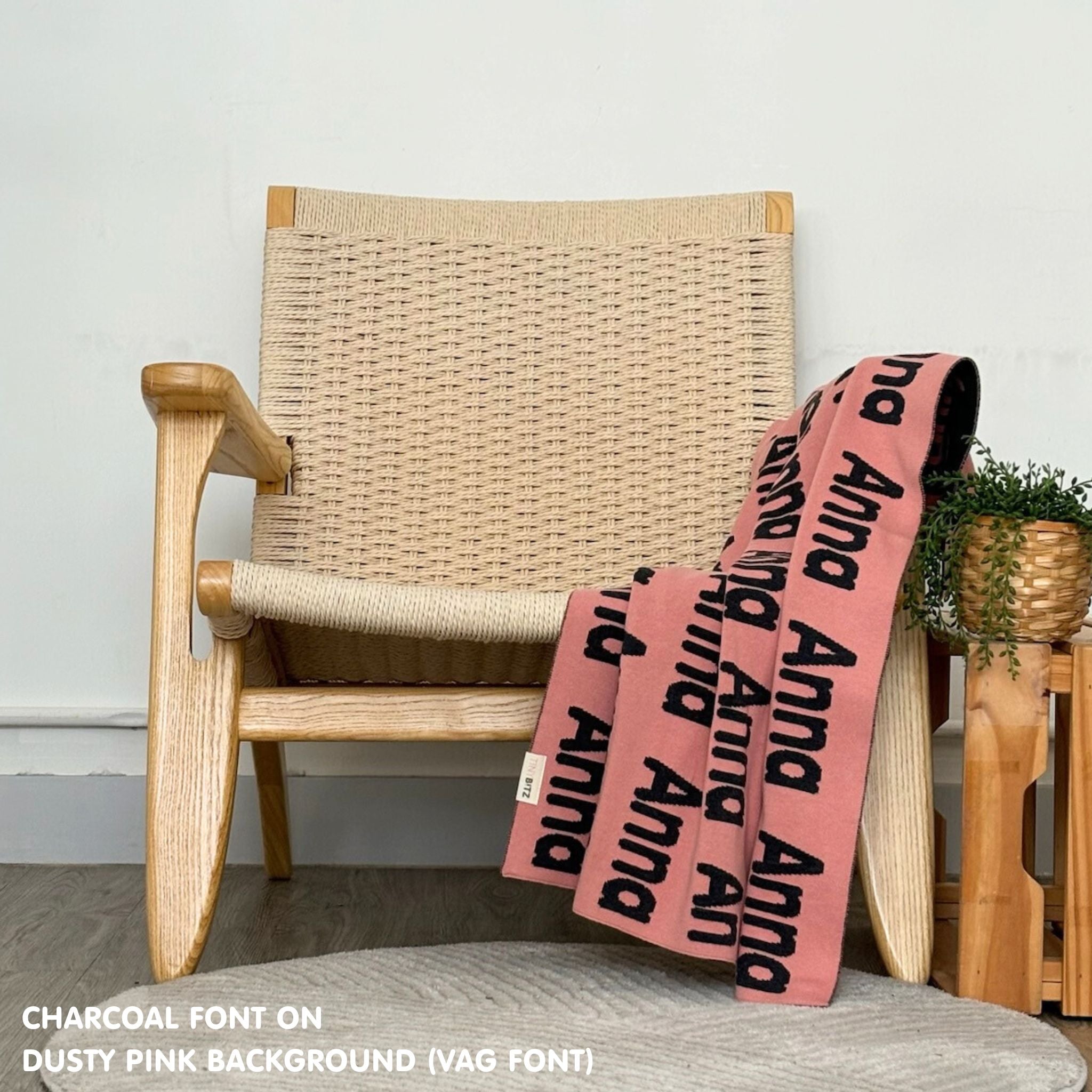 Knitted Children blanket in dusty pink and charcoal, customised with kid's name, made by TinyBitz.