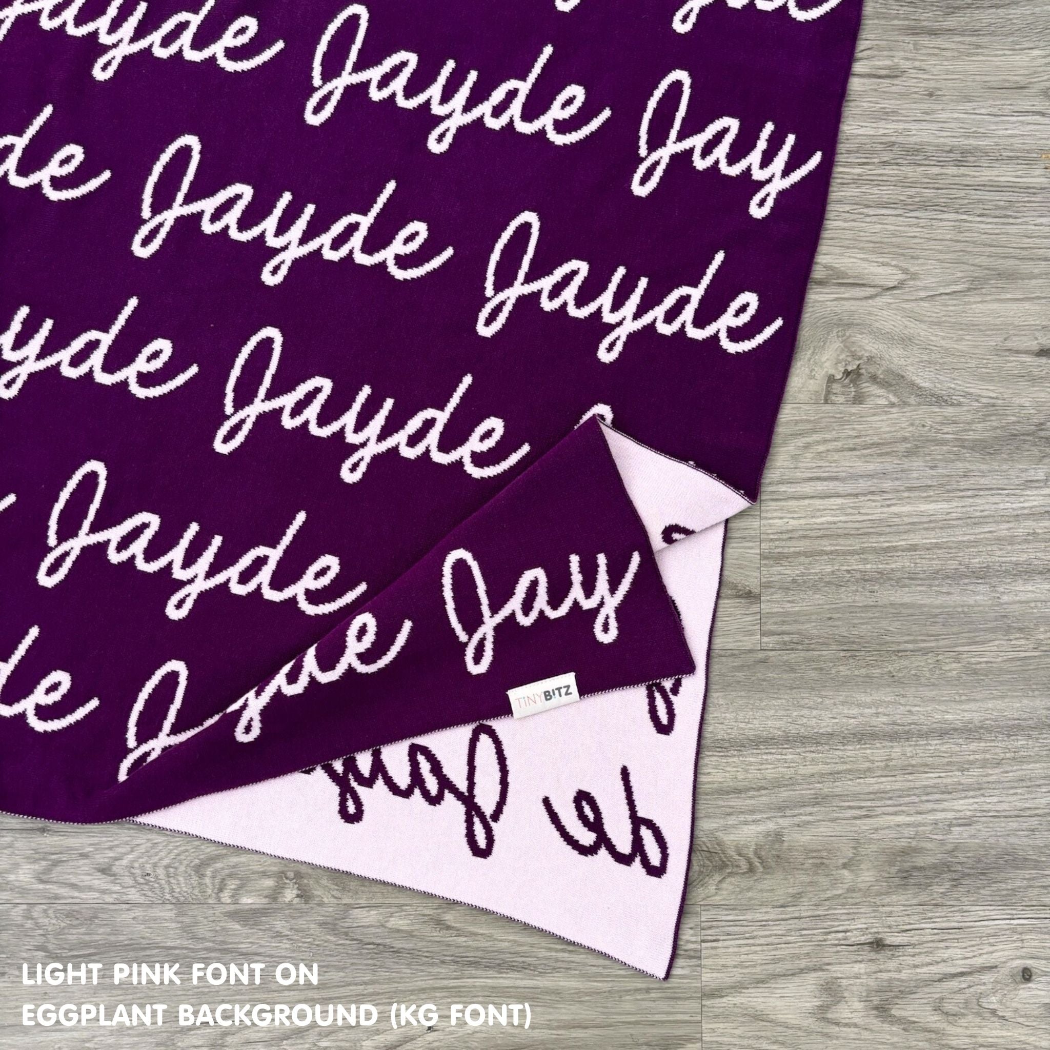 TinyBitz Kids Blanket in eggplant and light pink, personalized with child's name and made from 100% cotton.