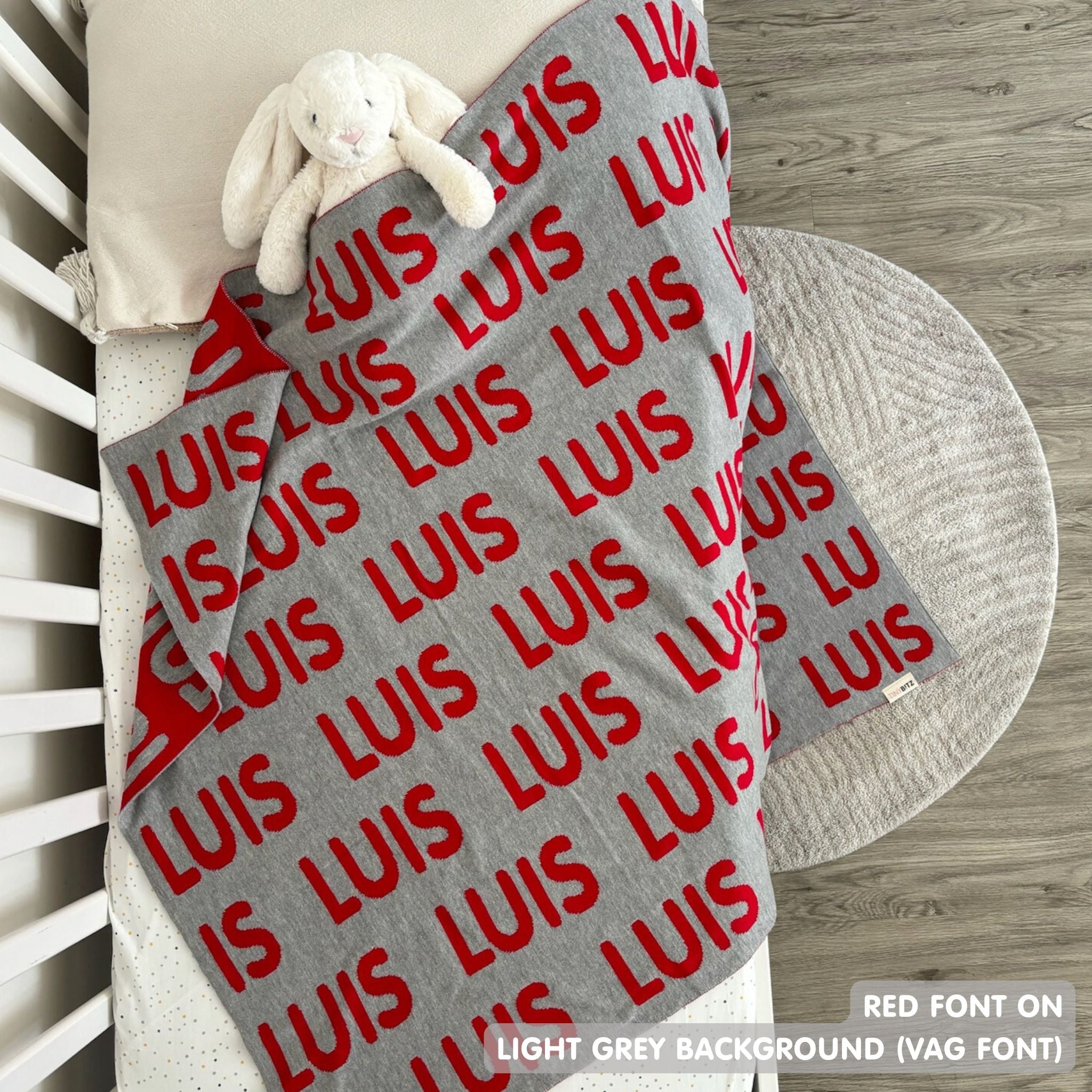 Custom cotton blanket for girls in light grey and red, personalized by TinyBitz.