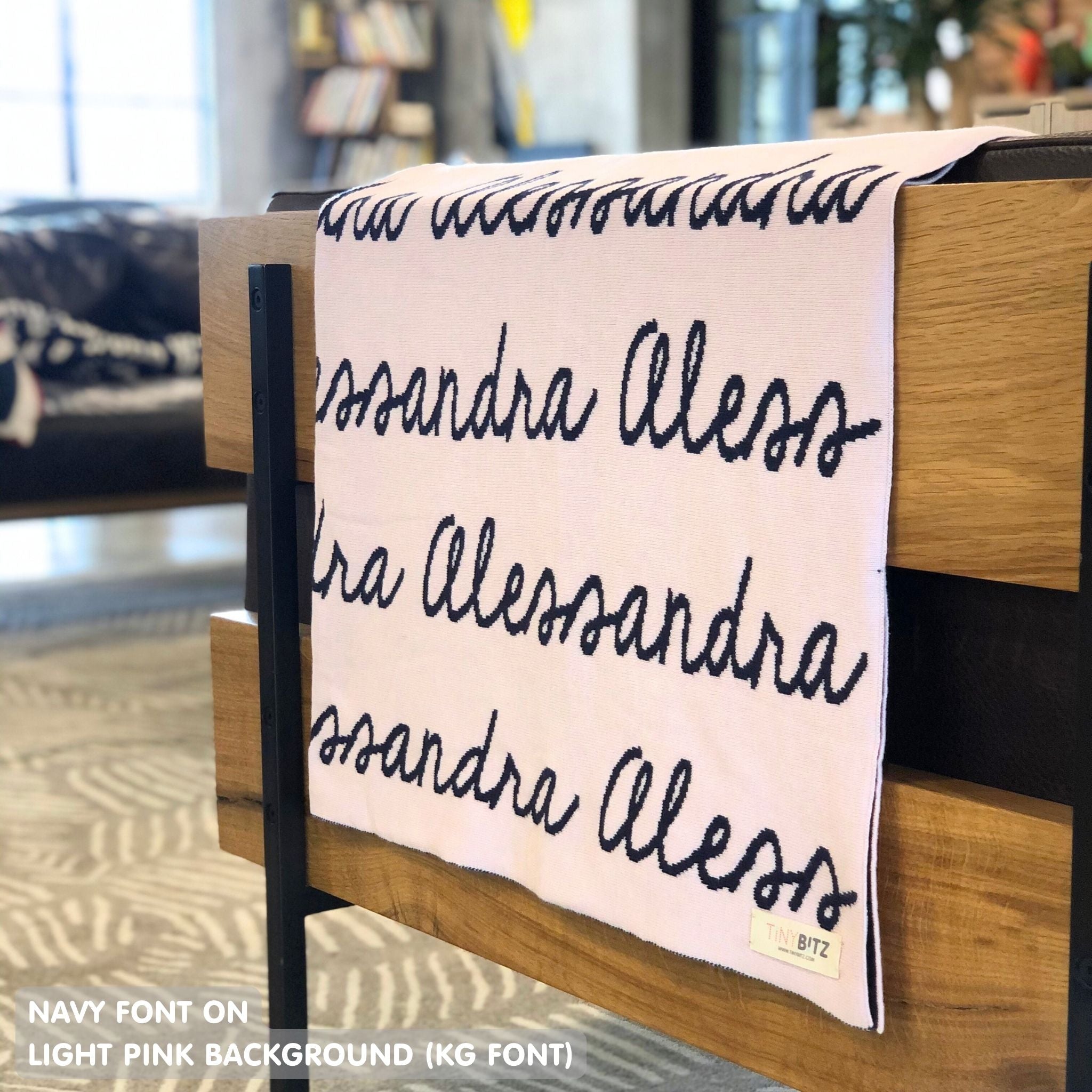 Custom cotton blanket for girls in light pink and navy, personalized by TinyBitz.