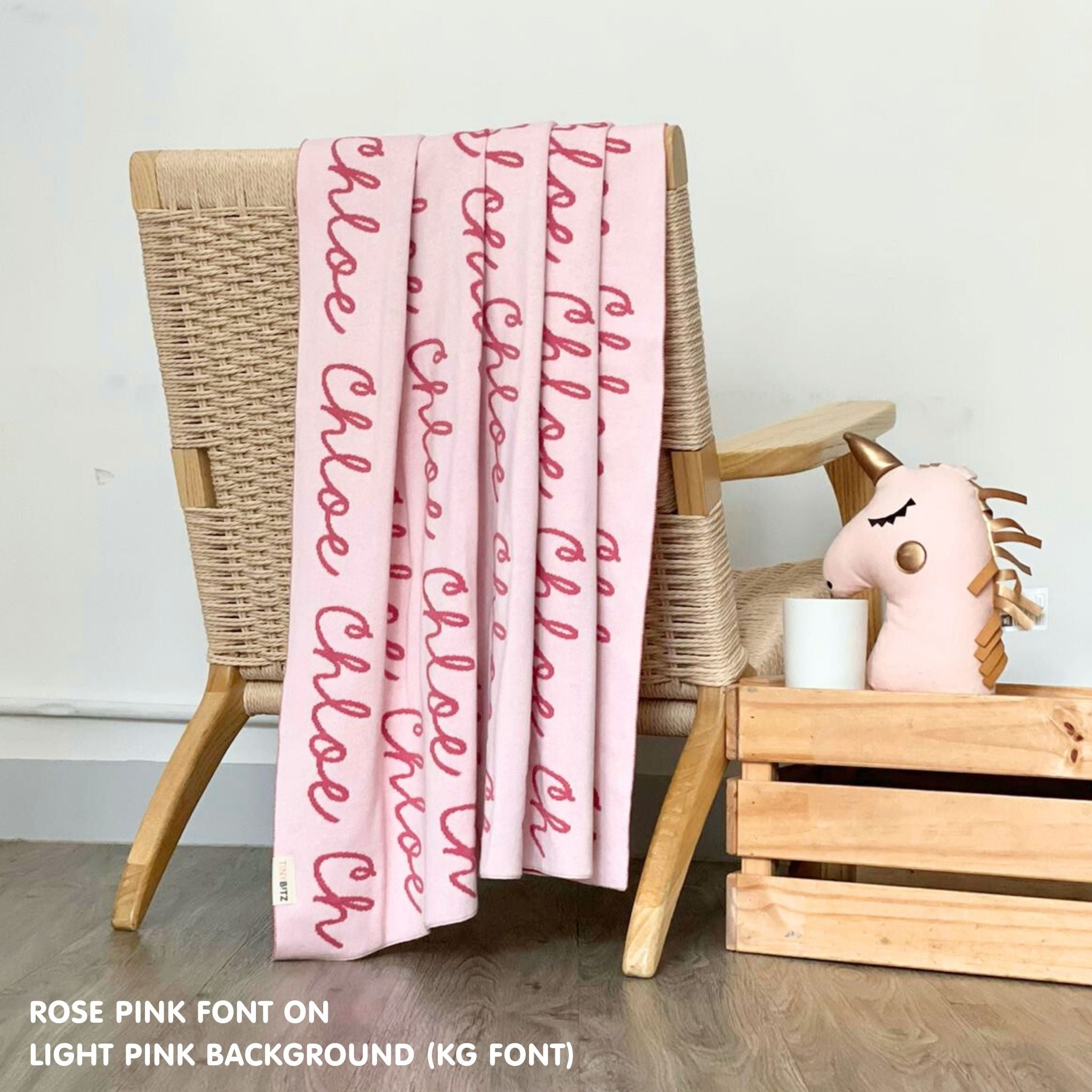 TinyBitz Kids Blanket in light pink and rose pink, personalized with child's name and made from 100% cotton.