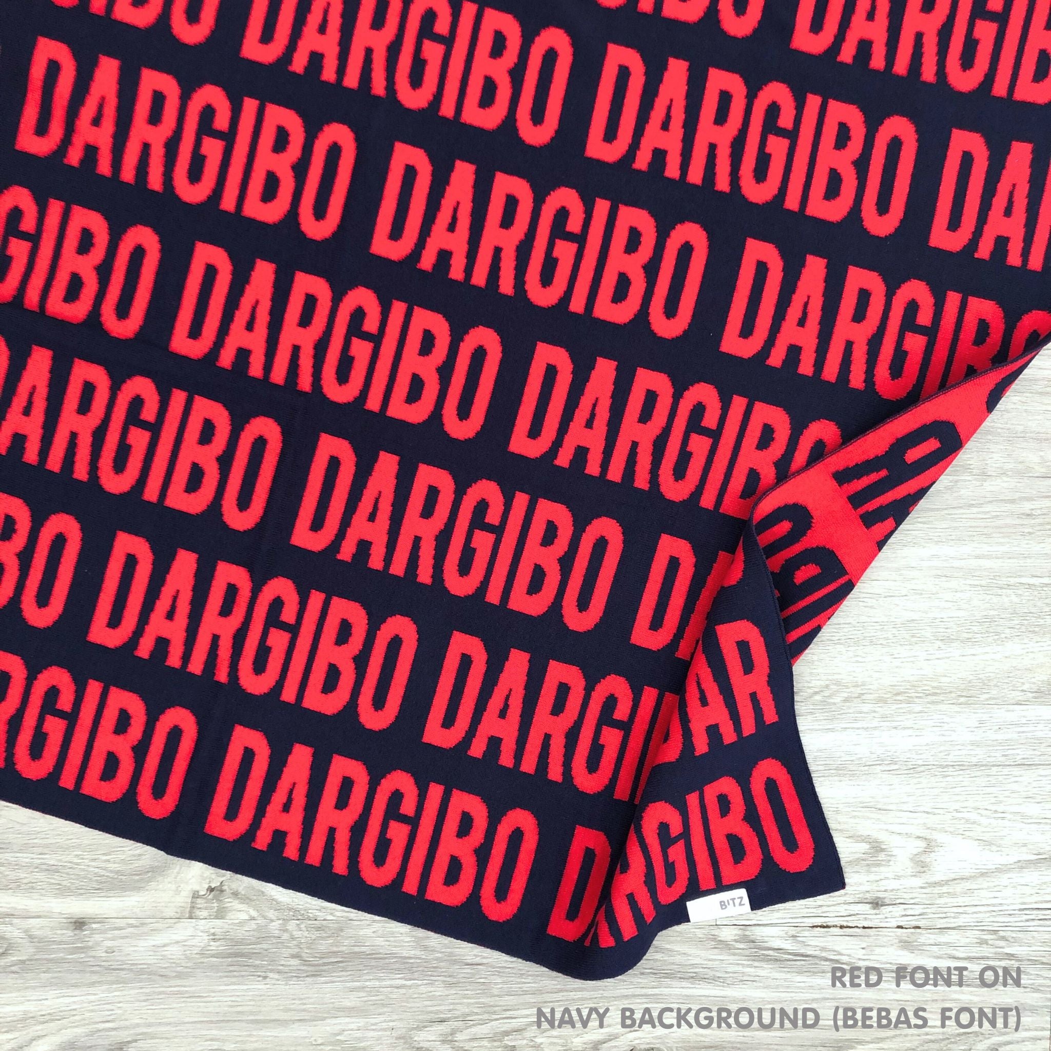 TinyBitz Kids Blanket in navy and red, personalized with child's name and made from 100% cotton.