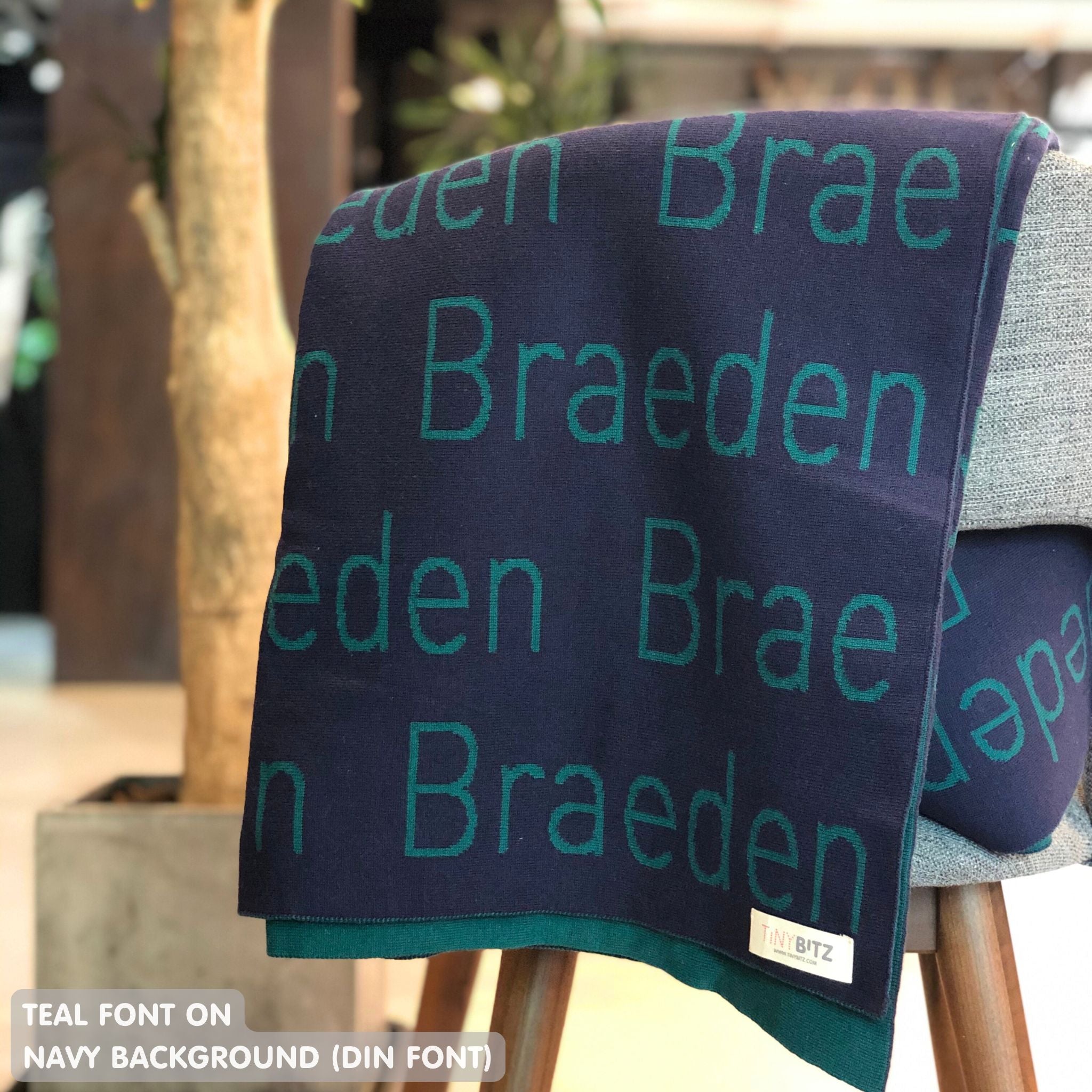 TinyBitz Custom blanket for boys, knitted from navy and teal, making the perfect birthday gift!