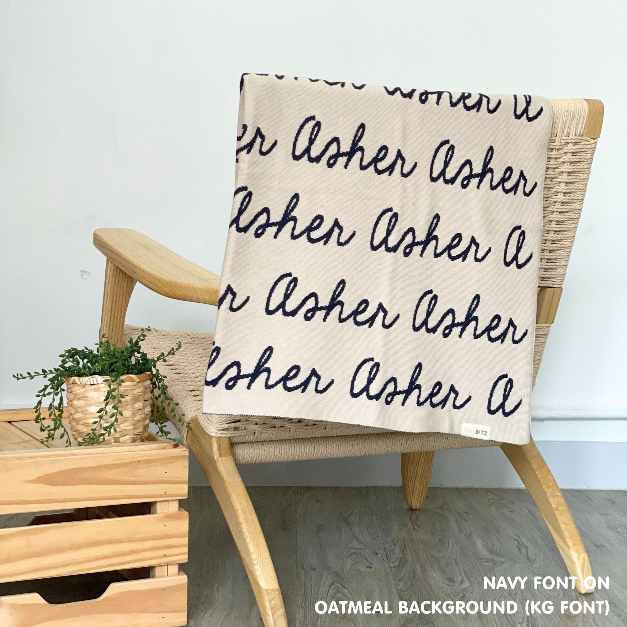 Cotton Kids Blanket with name knitted in oatmeal and navy, made by TinyBitz.