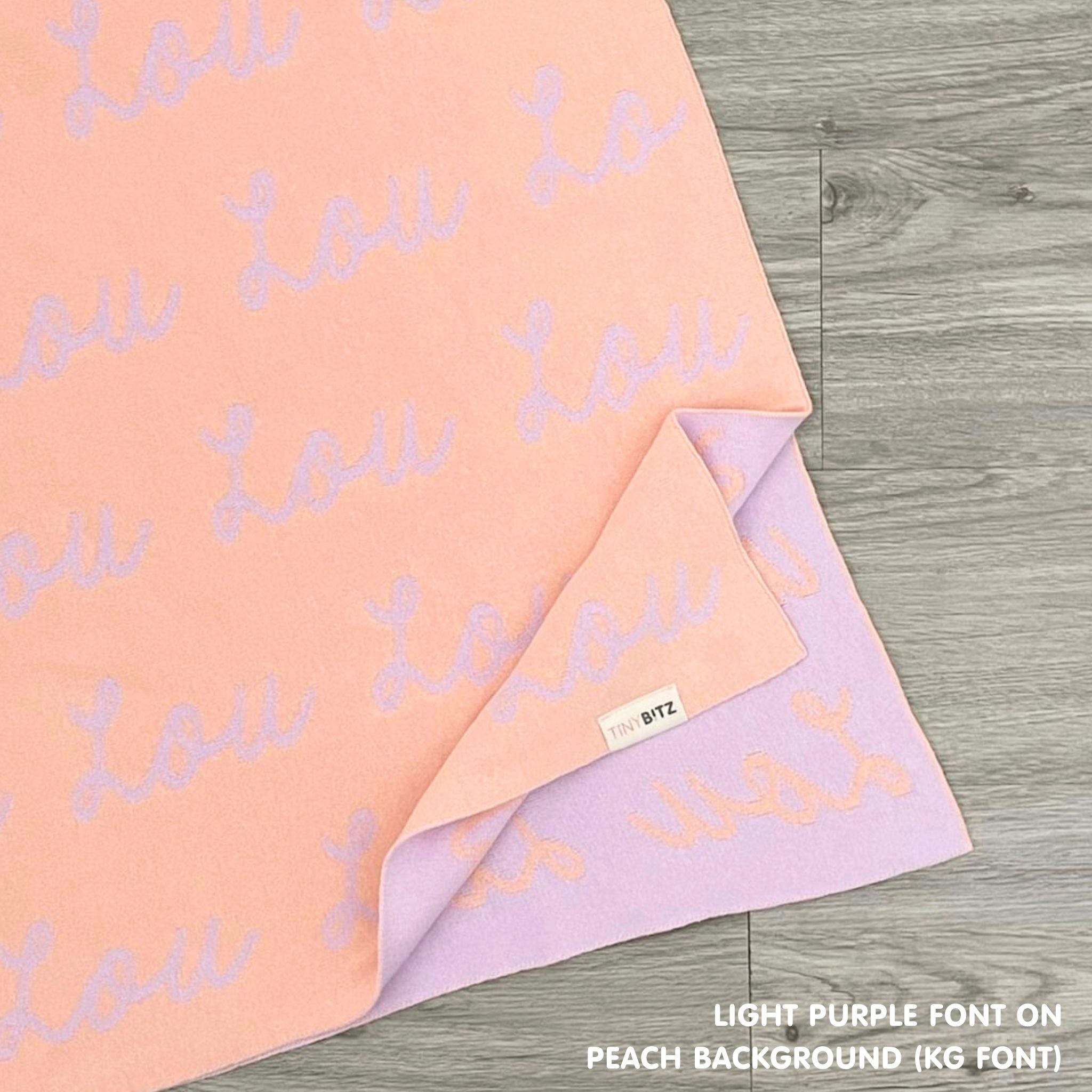 Custom cotton blanket for girls in peach and light purple, personalized by TinyBitz.
