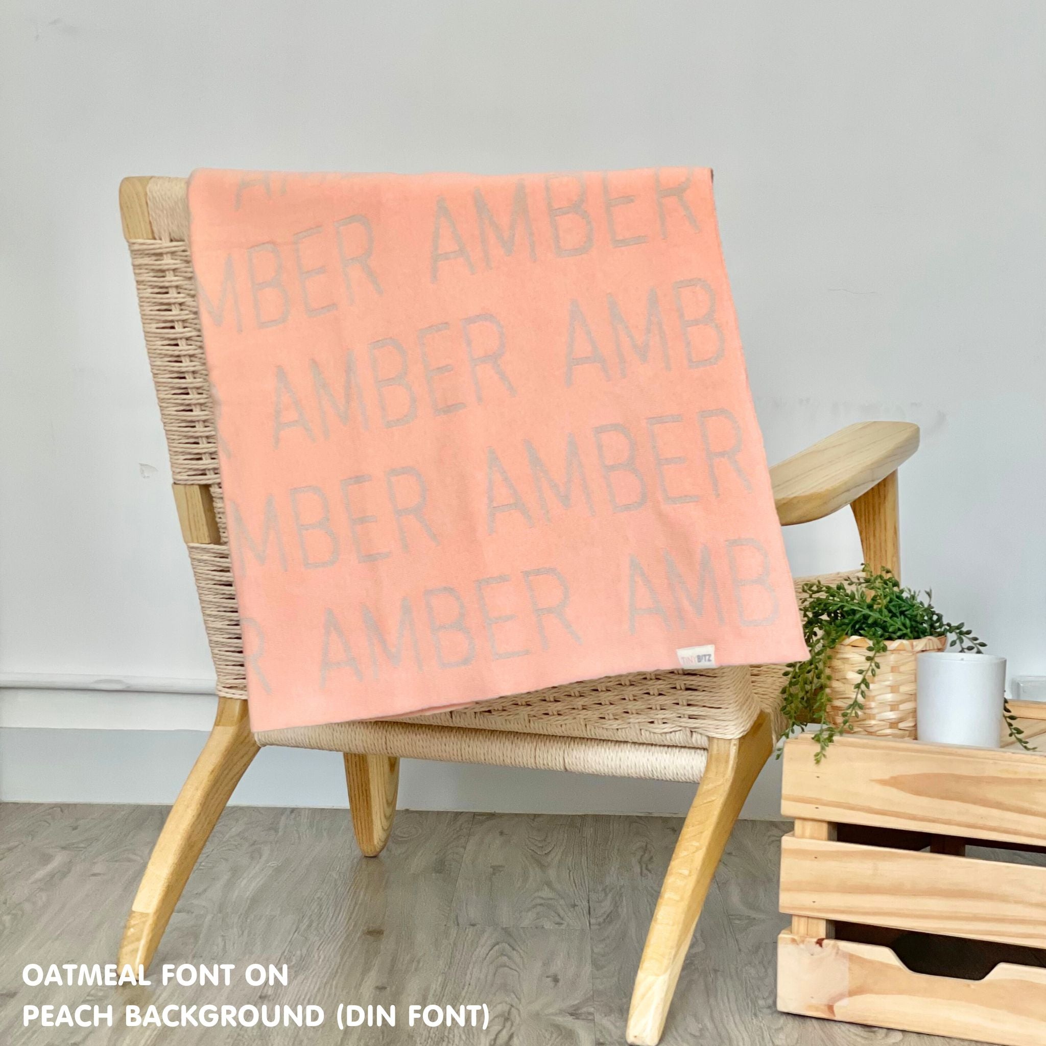 TinyBitz personalized girls knitted name blanket in peach background, perfect gift for birthdays and special occasions!