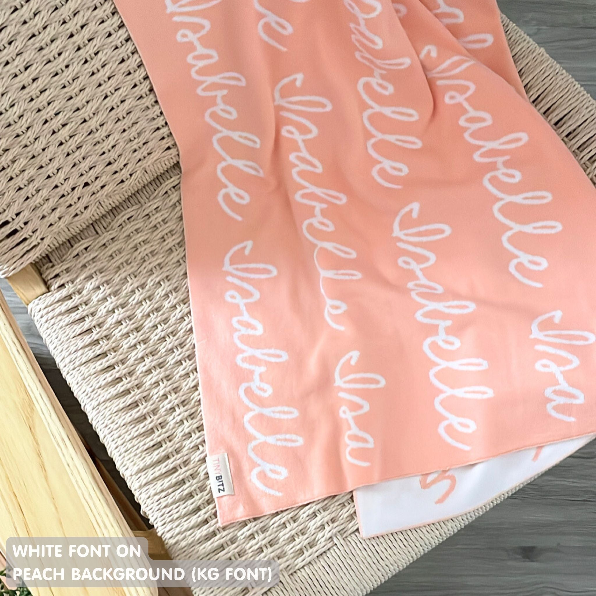 TinyBitz Personalized kids knitted name blanket in peach and white, perfect as a birthday gifts for kids!