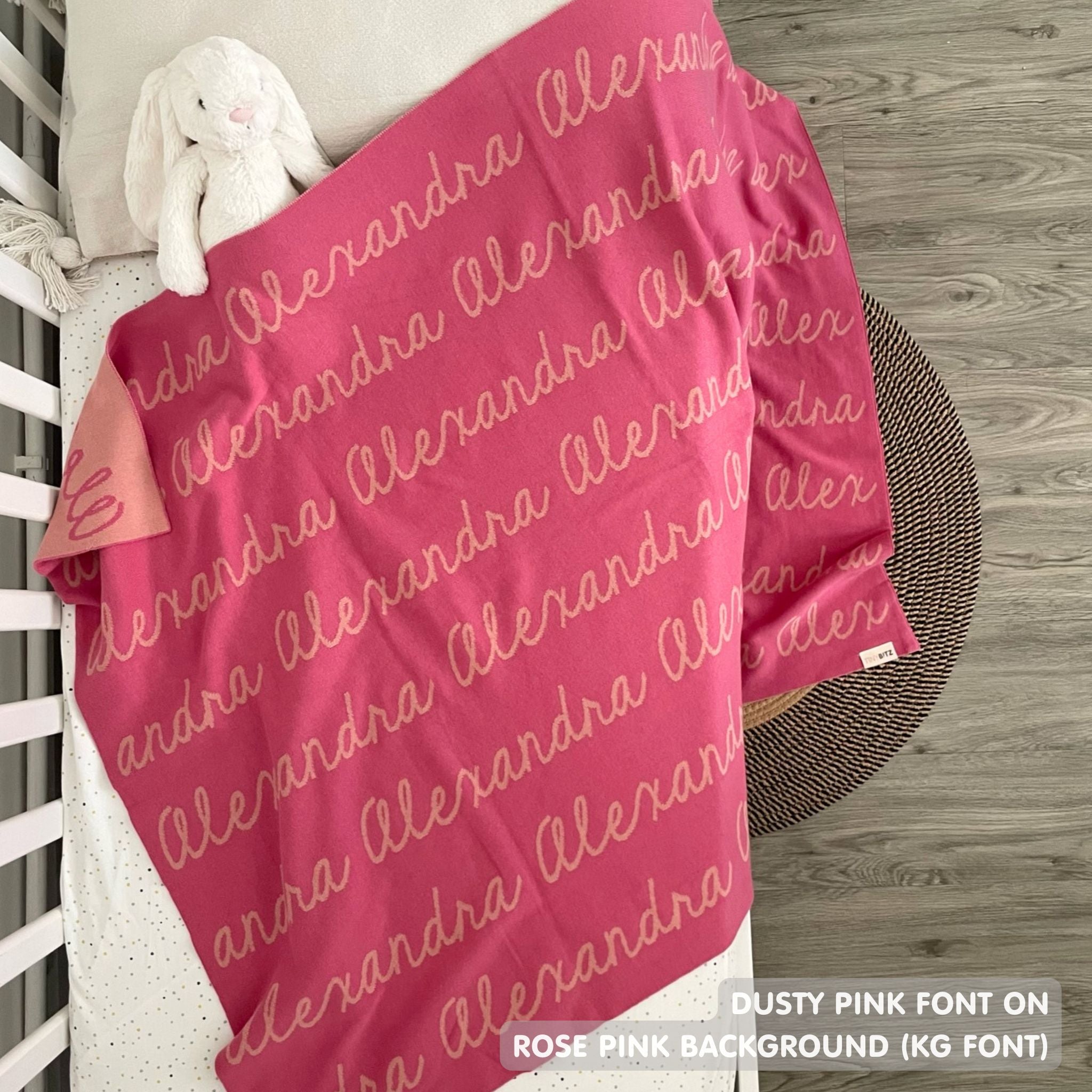 Knitted Children blanket in rose pink and dusty pink, customised with kid's name, made by TinyBitz.