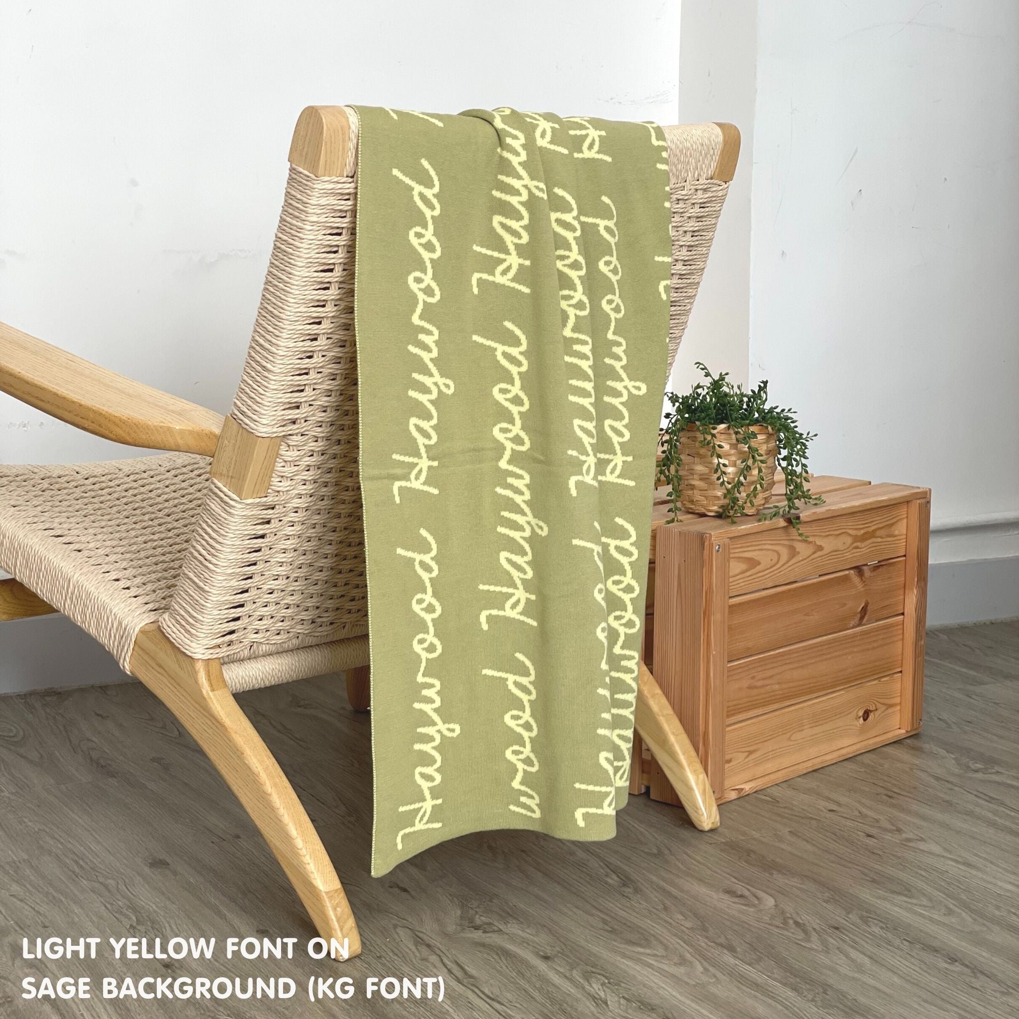 TinyBitz knitted cotton blanket in sage and light yellow, personalized with your kid’s name.