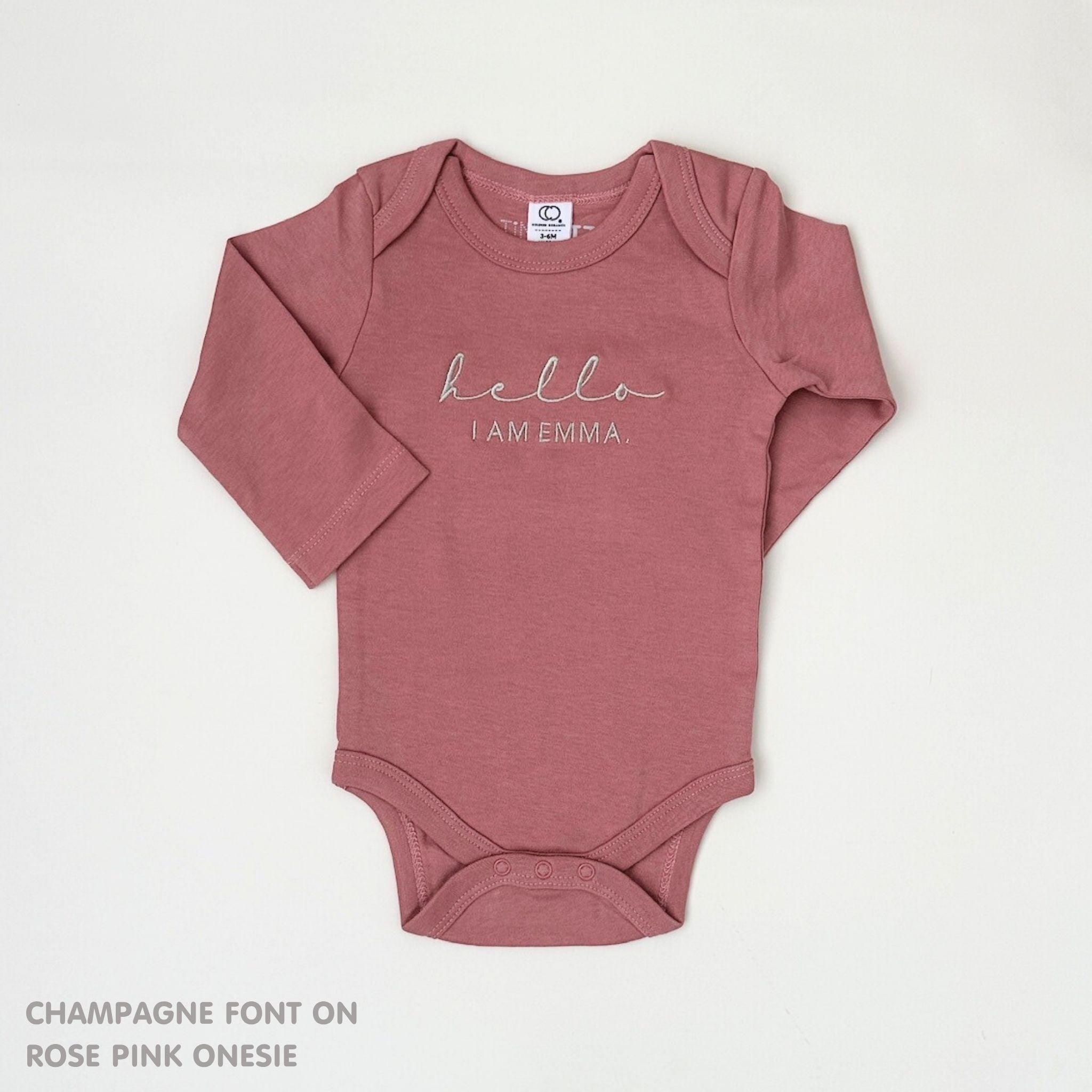 Personalised baby onesie with name embroidery in soft rose pink cotton, custom newborn gift by TinyBitz